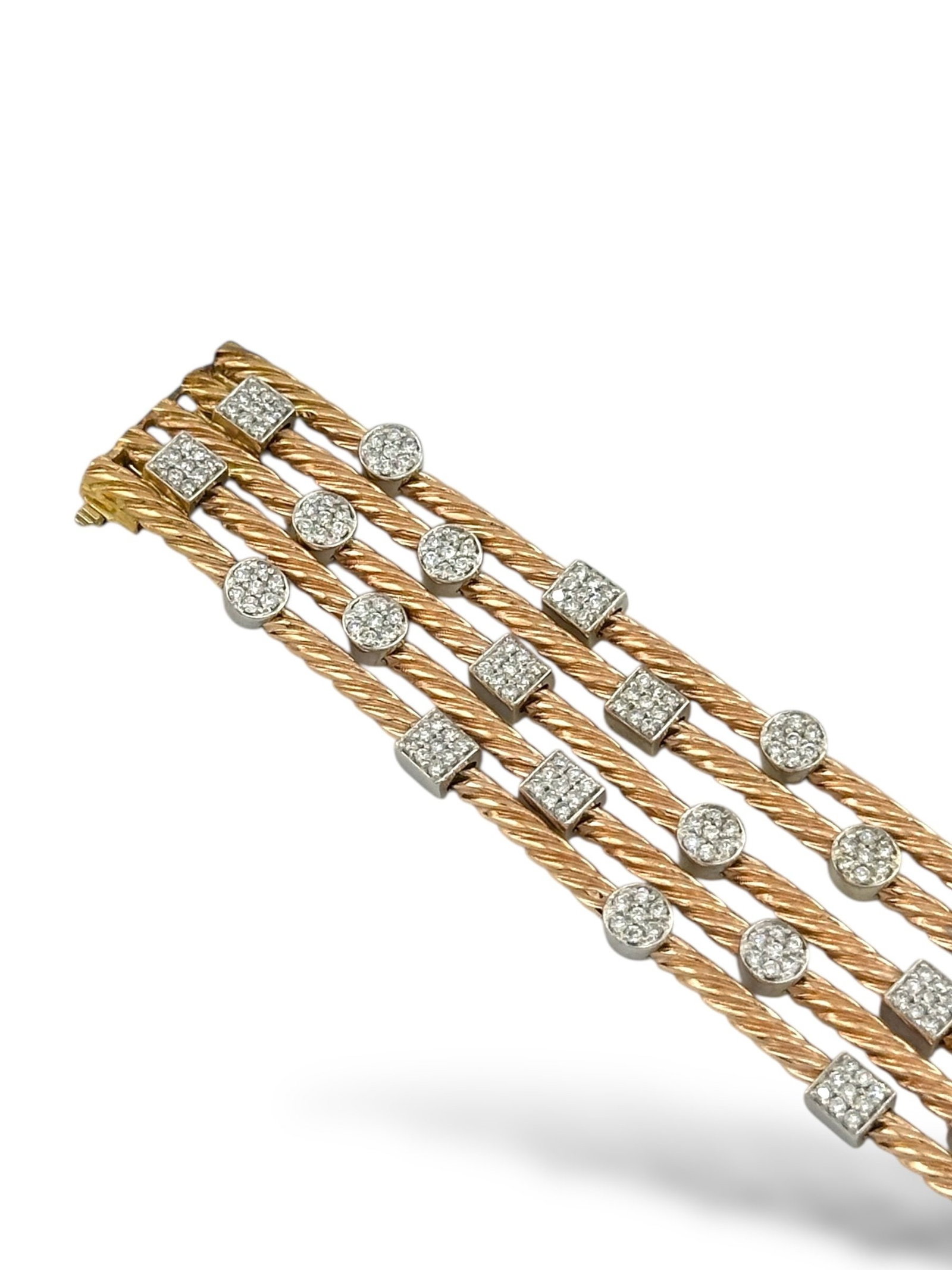 14K Yellow Gold Multi-Band Bracelet with 3.3ct of Diamonds: 14K Yellow Gold Multi-Band Bracelet with 3.3 Carats of Diamonds This striking 14K yellow gold bracelet features five intricately designed rope-style bands, each adorned with alternating circular and s