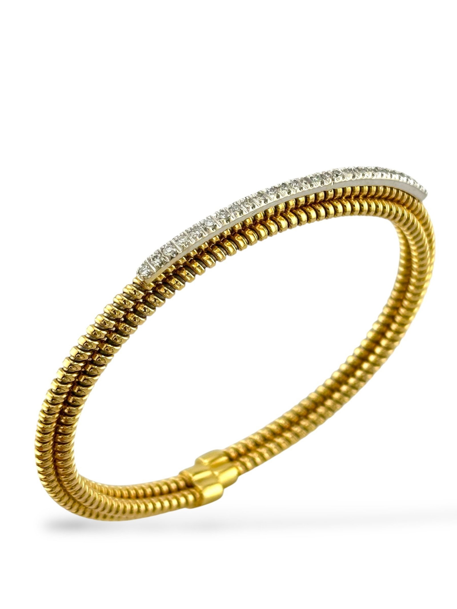 18K Yellow Gold Bracelet with 0.8ct Diamonds: 18K Yellow Gold Bracelet with 0.8ct Diamonds A refined piece of craftsmanship, this bracelet is fashioned in rich 18K yellow gold and adorned with twenty-five natural round diamonds. Each stone, cut a