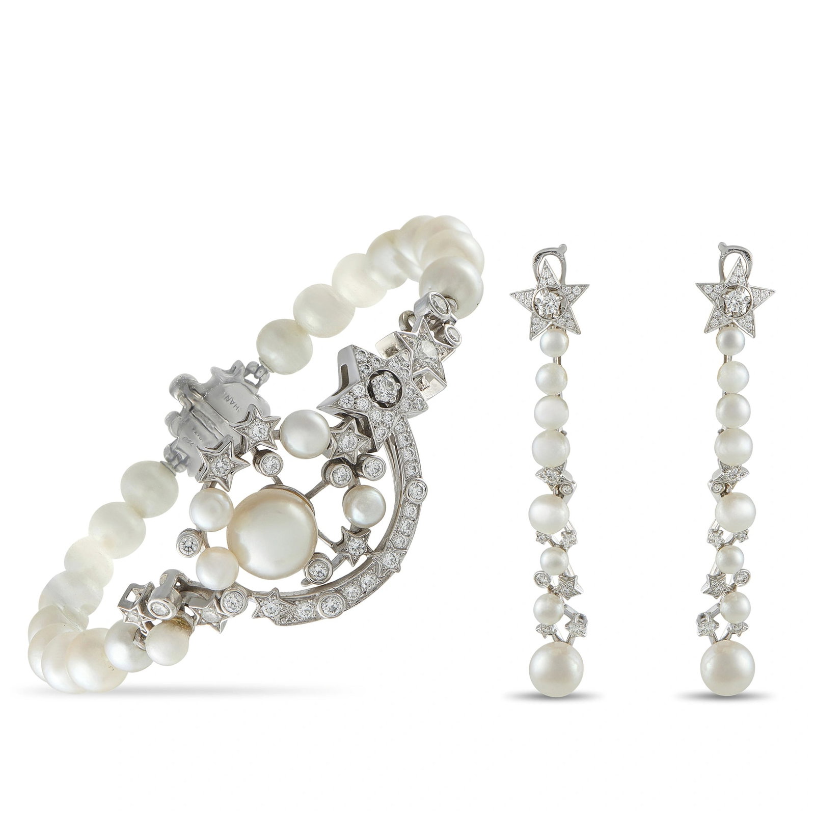 Chanel Comète 18K White Gold 2.50ct Diamond and Pearl Earrings: Star motifs and stunning designs that recall constellations make this Chanel Comète earrings and bracelet set simply breathtaking. Crafted from 18K White Gold, both pieces feature luminous cultured p
