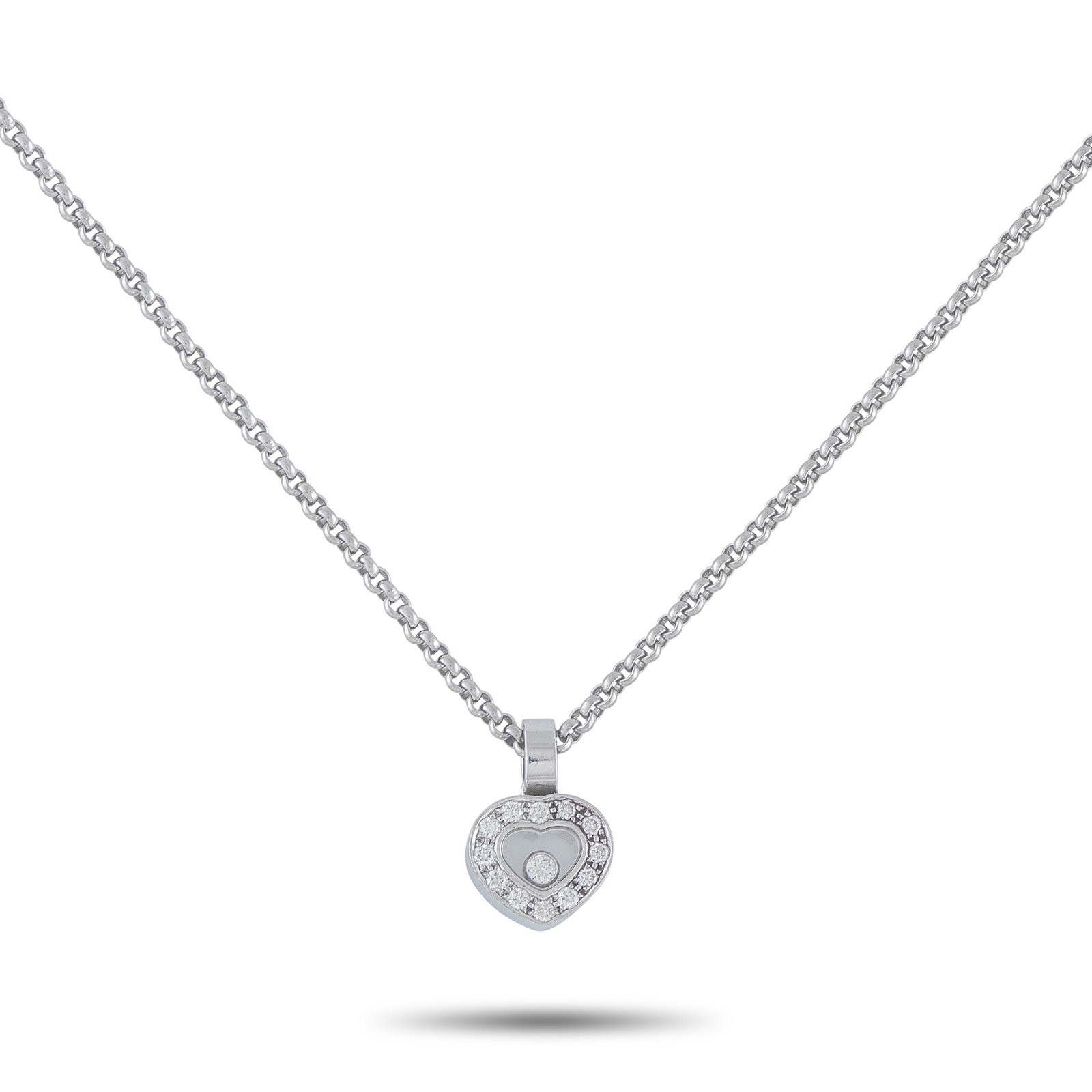 Chopard Happy Diamonds 18K White Gold Diamond Pendant: This Chopard Happy Diamonds necklace will add a touch of sparkle to any ensemble. The heart-shaped pendant features sparkling Diamond accents as well as a singular Diamond floating within the transpar