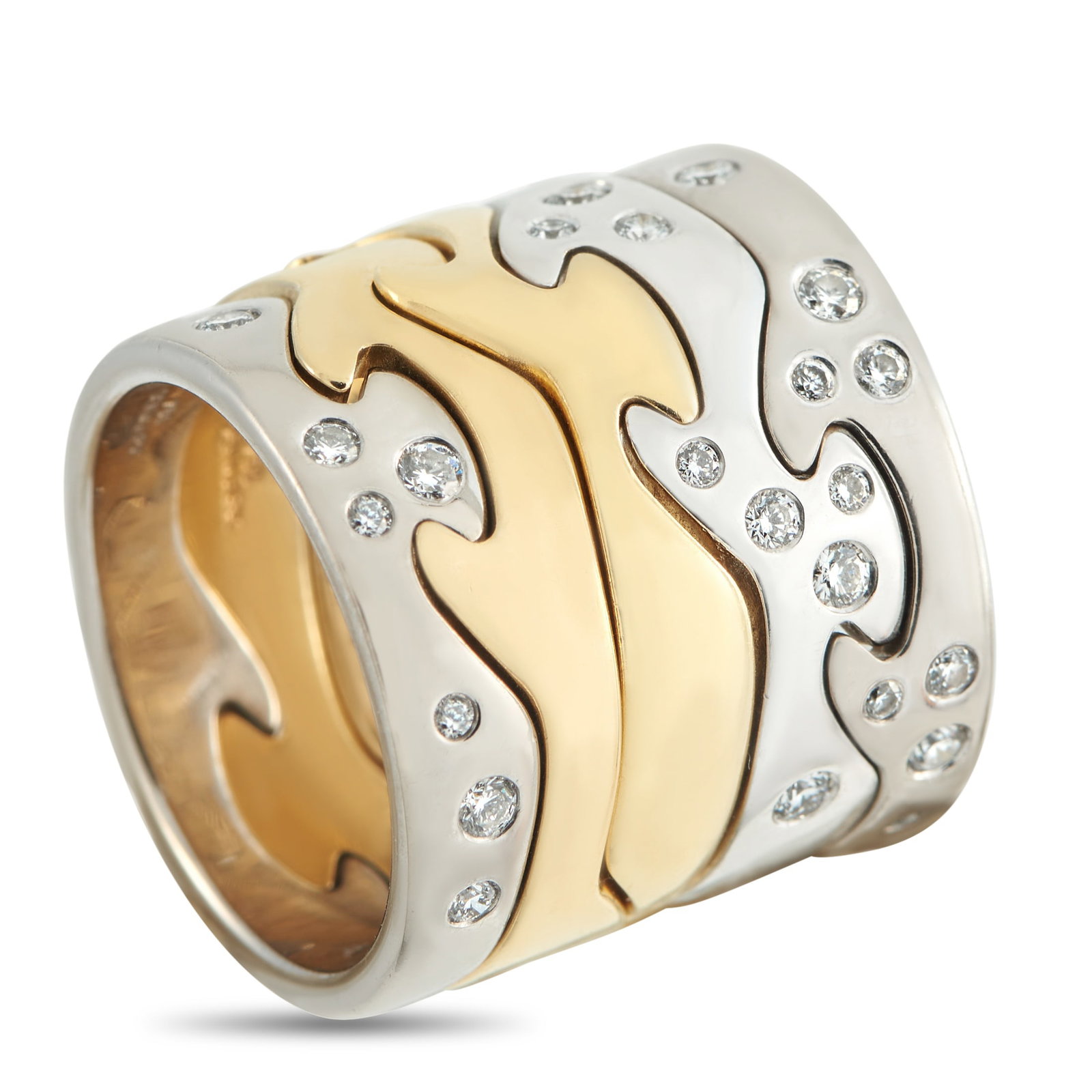 Georg Jensen Fusion 18K White and Yellow Gold Diamond 5 Piece Puzzle Ring: This stunning Georg Jensen Fusion ring combines 5 interlocking rings crafted from 18K White Gold and 18K Yellow Gold. A celebration of graphic form and contemporary elegance, inset diamonds on the 18K