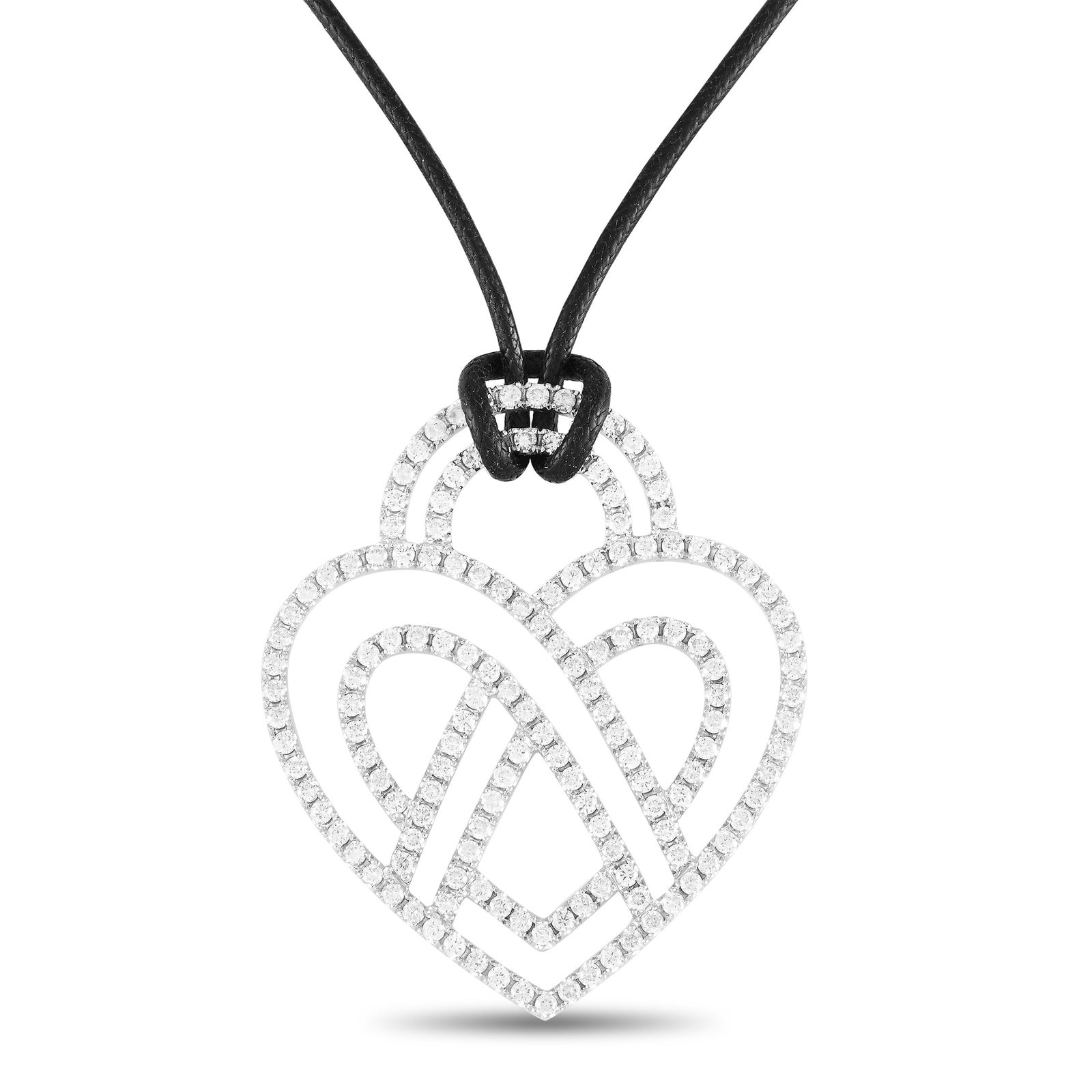 Poiray 18K White Gold 3.75ct Diamond Heart Necklace: A grand display of style from Poiray, this large pendant necklace will steal your heart. The heart motif is shaped in 18K White Gold to mesmerizing effect. Its precious contours ripple with the luxuri