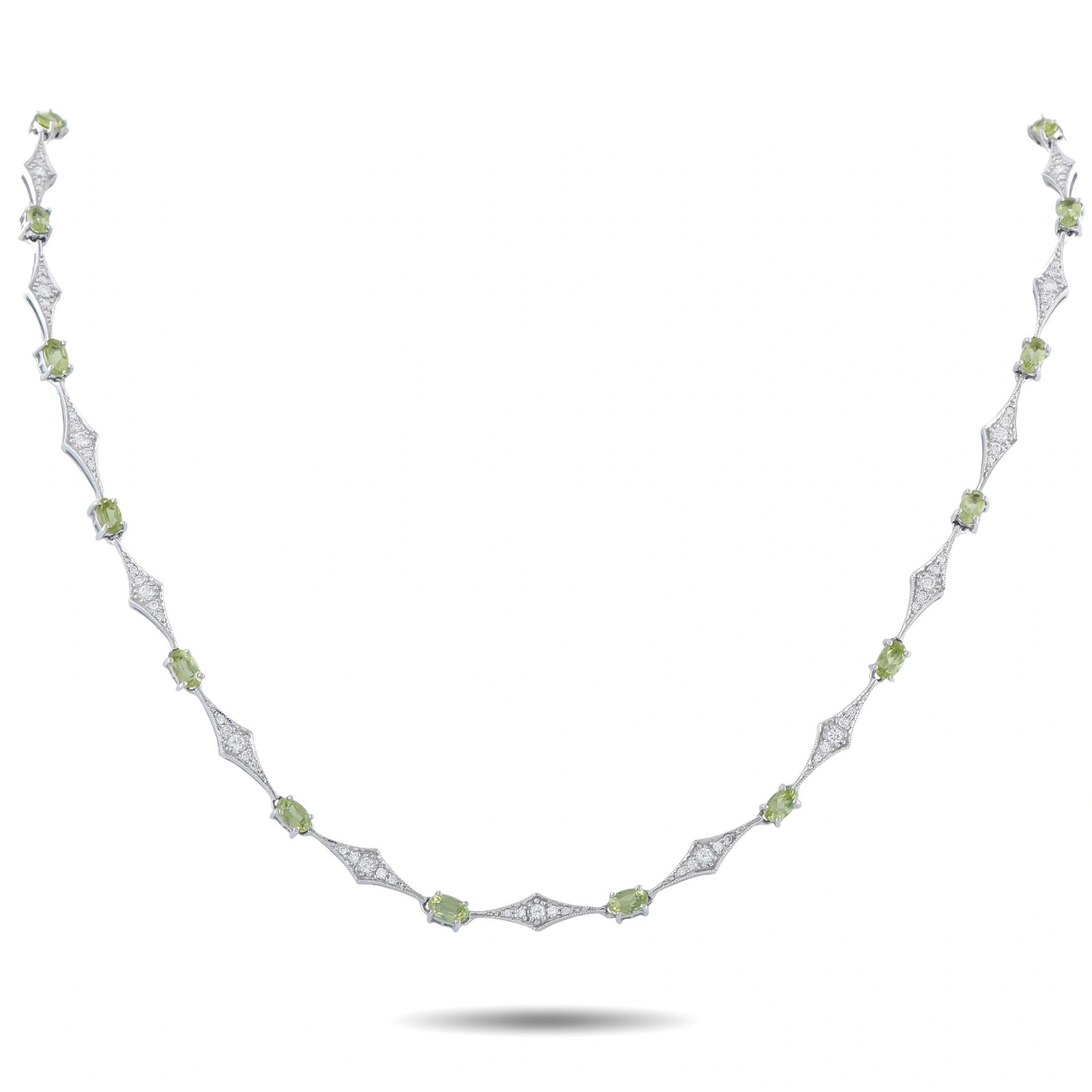 Laura Munder 18K White Gold 1.20ct Diamond and Peridot Station Necklace: A contemporary station necklace in 18K white gold by Laura Munder, set with vivid oval-cut peridots and round brilliant diamonds totaling approximately 1.20 carats. The design alternates prong-set ova