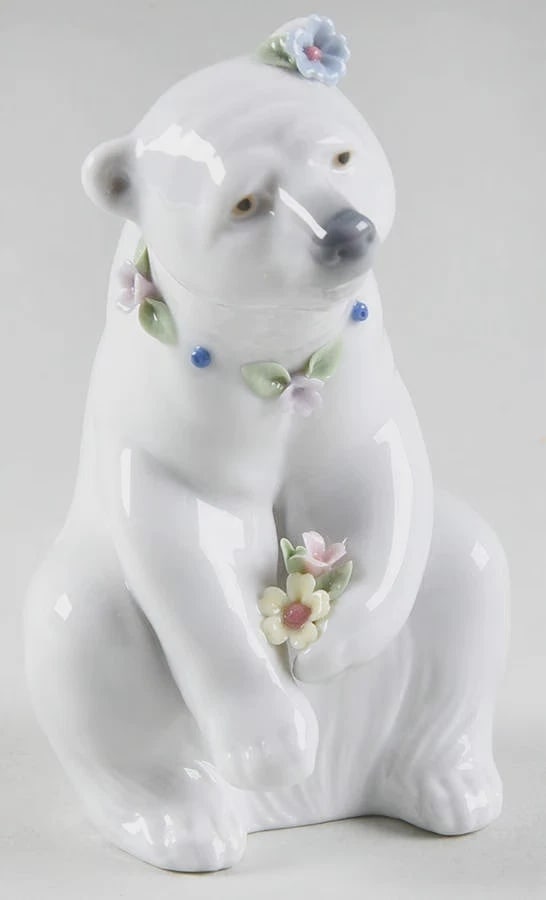LLADRO Polar Bear Resting With Flowers Animals Wild Retired 2001: LLADRO Polar Bear Resting With Flowers Animals WildHeight: 4 3/4 inStyle: 6355 GLOSSIntro Date: 1997Retired Piece: 2001Condition: Excellent