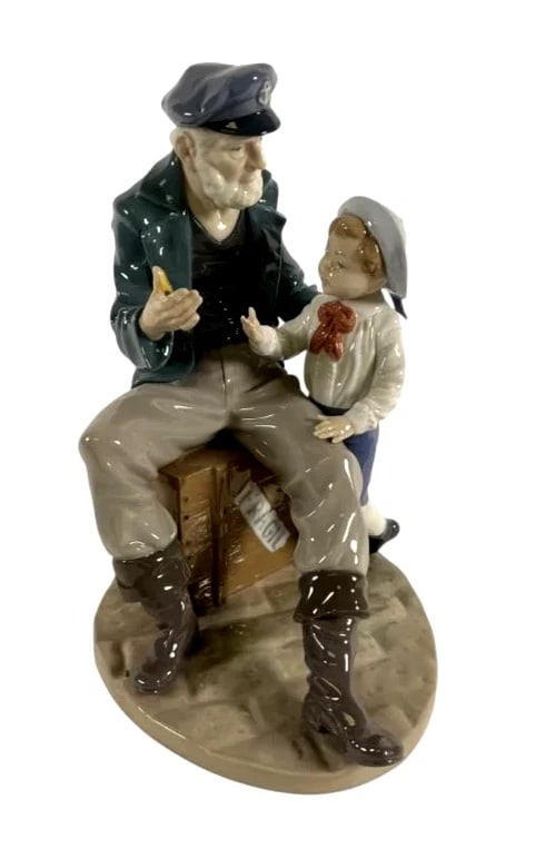 Lladro Porcelain A Tall Yarin 5207: Lladro Limited Edition Porcelain A Tall Yarin 5207Lladro porcelain figurine titled A Tall Yarin, model 5207, featuring an elderly sailor seated on a crate with a young boy by his side. Stands approxim
