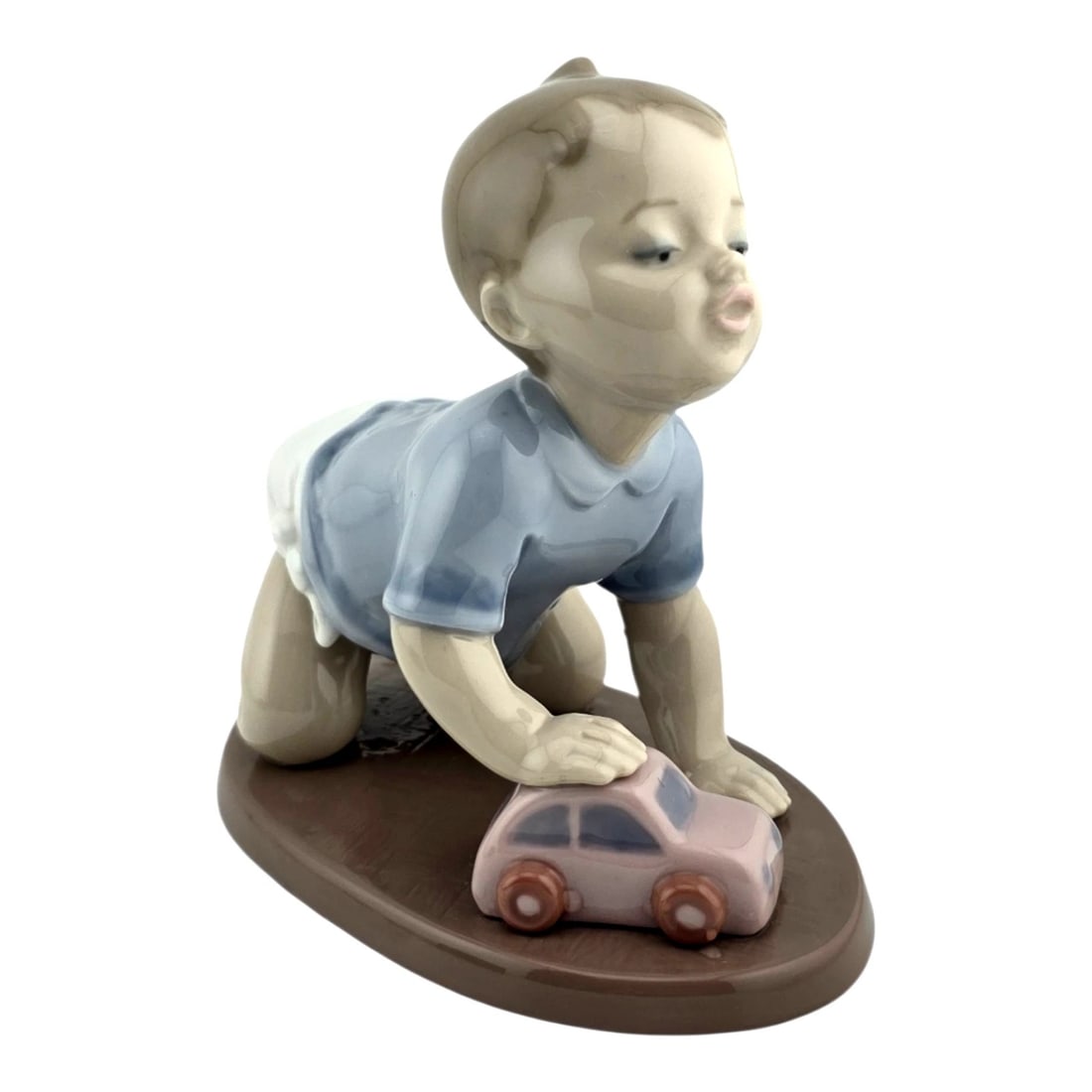 Lladro Vintage Limited Edition 2001 READY TO ROLL: Lladro Vintage Limited Edition 2001 READY TO ROLL LLADRO 2001 READY TO ROLL Spanish Name: Gateando Con Cochecito Sculptor: Joan CoderchYear Issued: 1997 Year Retired: 2001 Finish: Glazed Last Retail: 