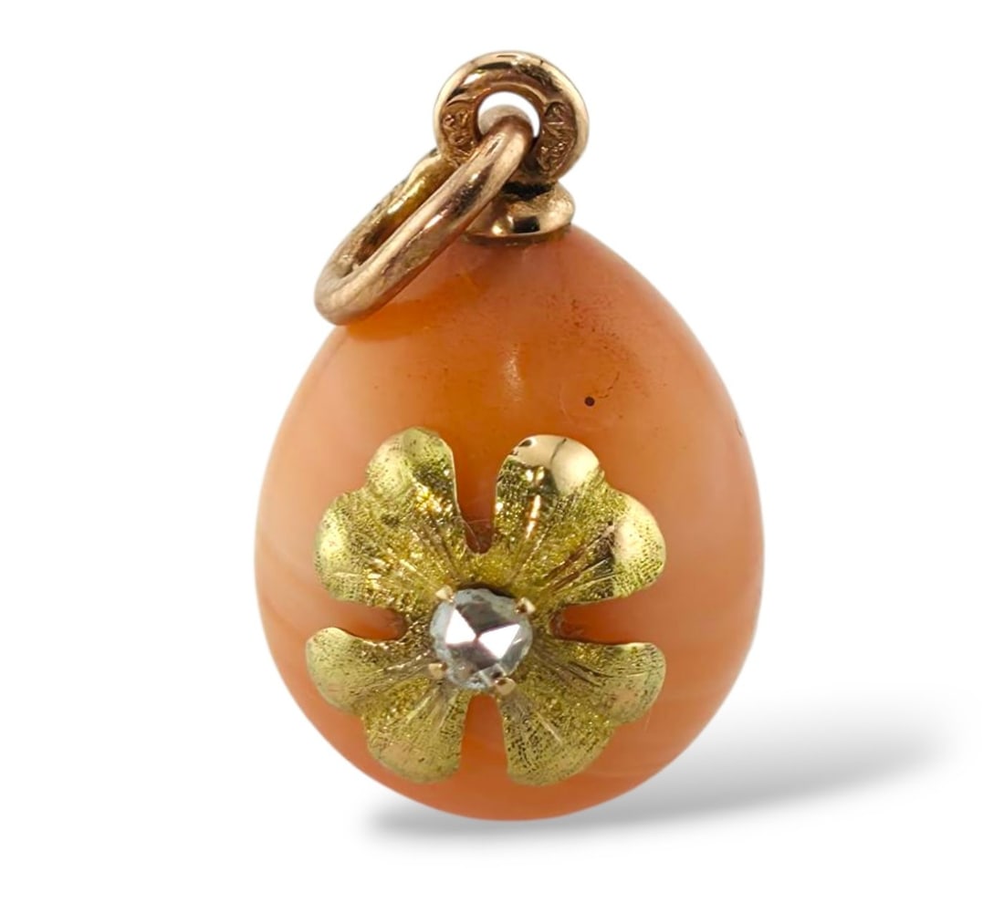 Imperial Russian Period, 56k (14K) Jeweled Gold and Diamond Egg pendant Diamond: A Faberge jeweled Imperial Russian 56k (14K) Gold Egg pendant Signed: Signed with work master Initials and 56 Imperial Russian Gold mark Workmaster initials H.W for Henrik Wigstrom (1862-1923) – wor