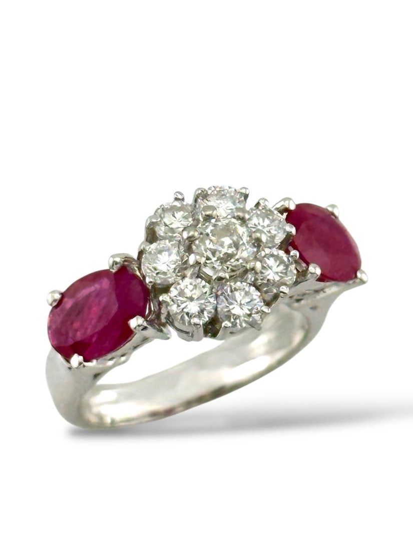 Platinum Ring with 5.1ct of Rubies and 1.01ct of Diamonds: Platinum Ring with 5.1 Carats of Rubies and 1.01 Carats of Diamonds A remarkable antique treasure, this women's ring exemplifies the elegance of platinum craftsmanship. At its heart lie two extraordin