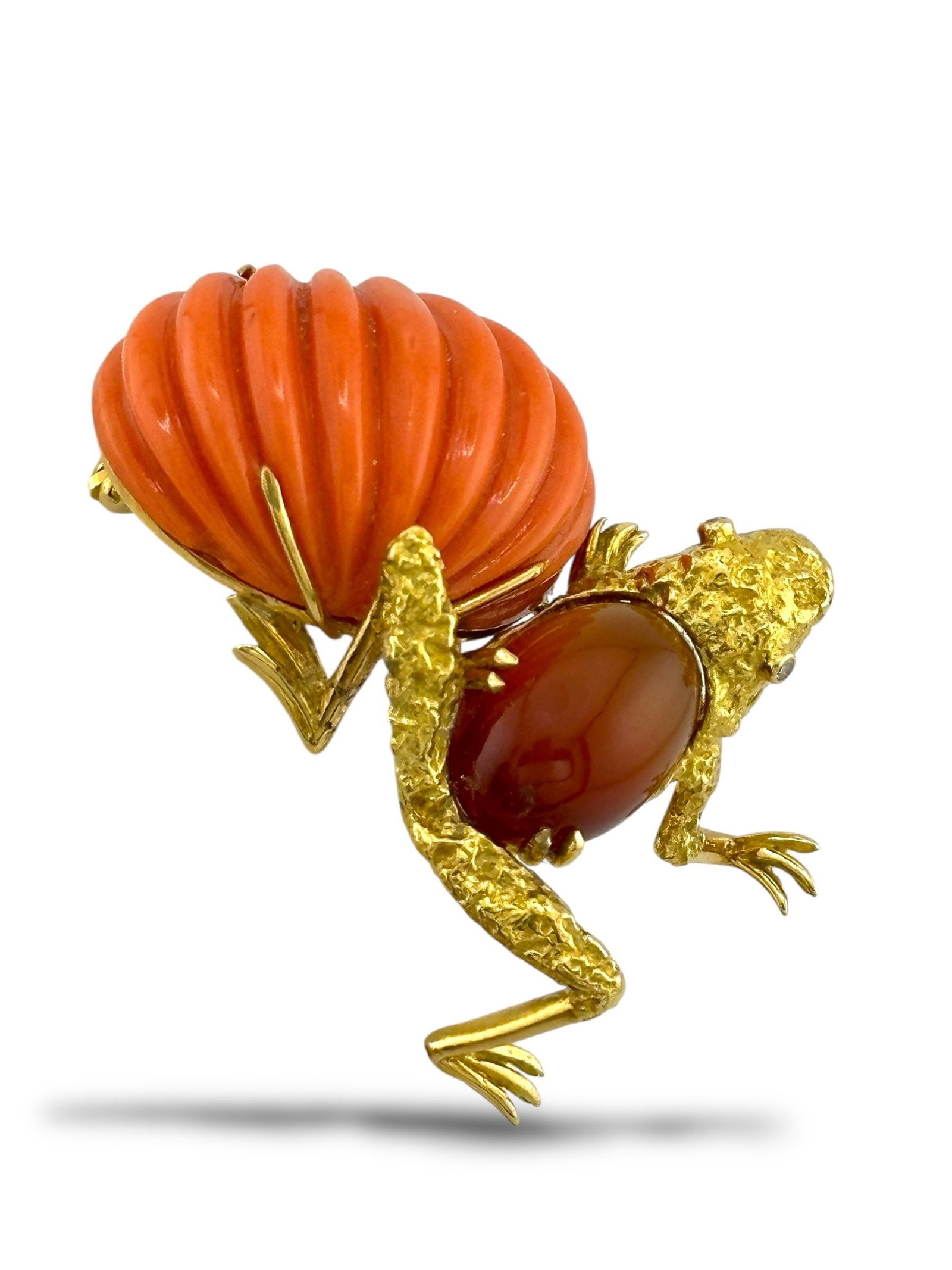 Hammerman Brothers Vintage 18K Yellow Gold Frog Brooch with Large Coral and Burnt Sienna Stone: Vintage Hammerman Brothers 18K Yellow Gold Frog Brooch with Large Coral and Burnt Sienna Stone A playful and imaginative brooch crafted from 18K yellow gold in the form of a frog, set with a striking 