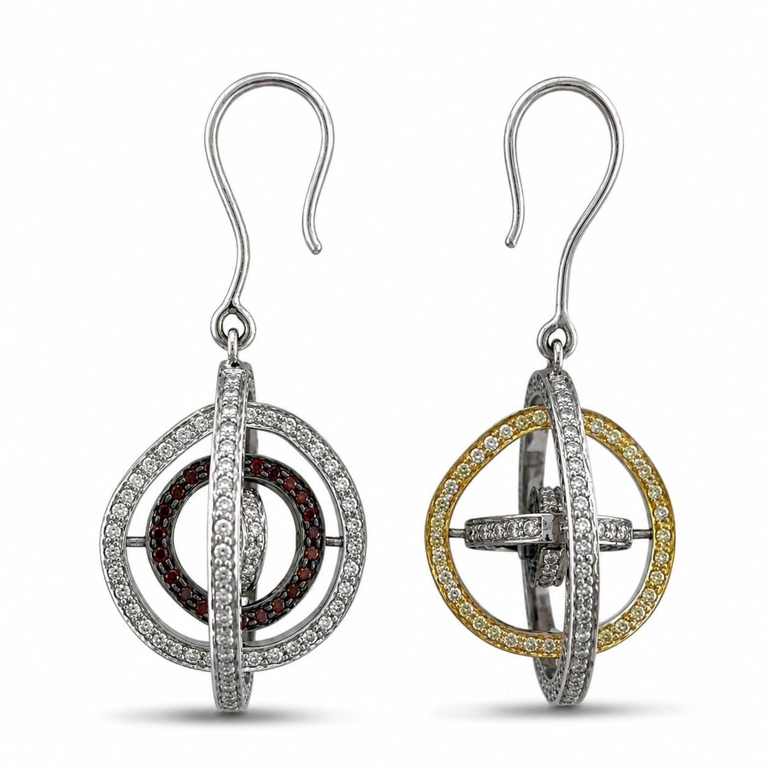 Platinum 5.00ct Diamond Convertible Circle Earrings: Platinum 5.00ct Diamond Convertible Circle Earrings A highly distinctive pair of platinum earrings crafted with a complex four ring circular design, creating a sculptural three-dimensional effect. Eac