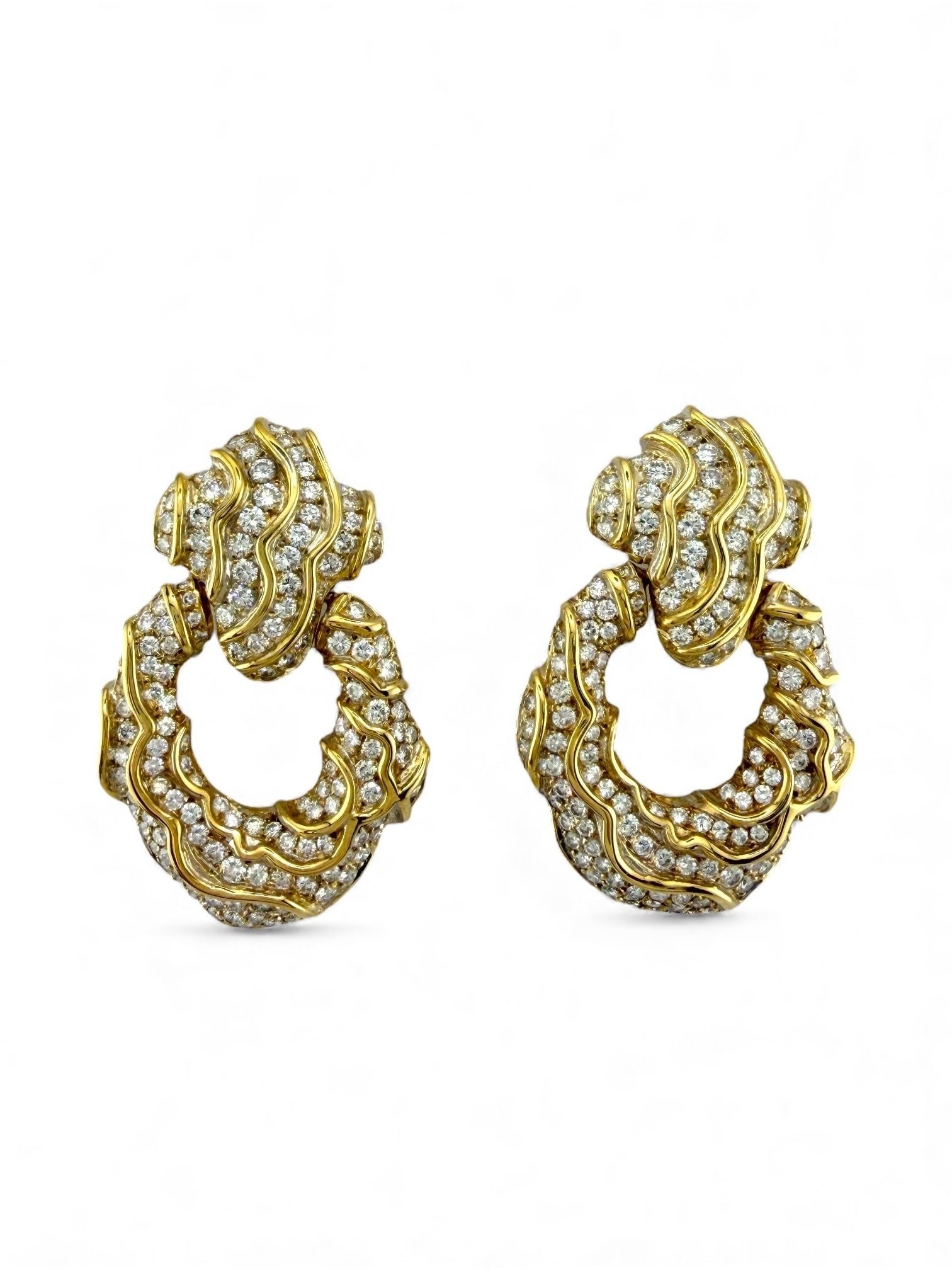 18K Yellow Gold 9.5ct Diamond Wavy Large Earrings: Pair of 18K Yellow Gold Diamond Wavy Earrings An extraordinary pair of earrings crafted in solid 18K yellow gold, showcasing a bold and fluid wavy design that reflects light with graceful movement. Se