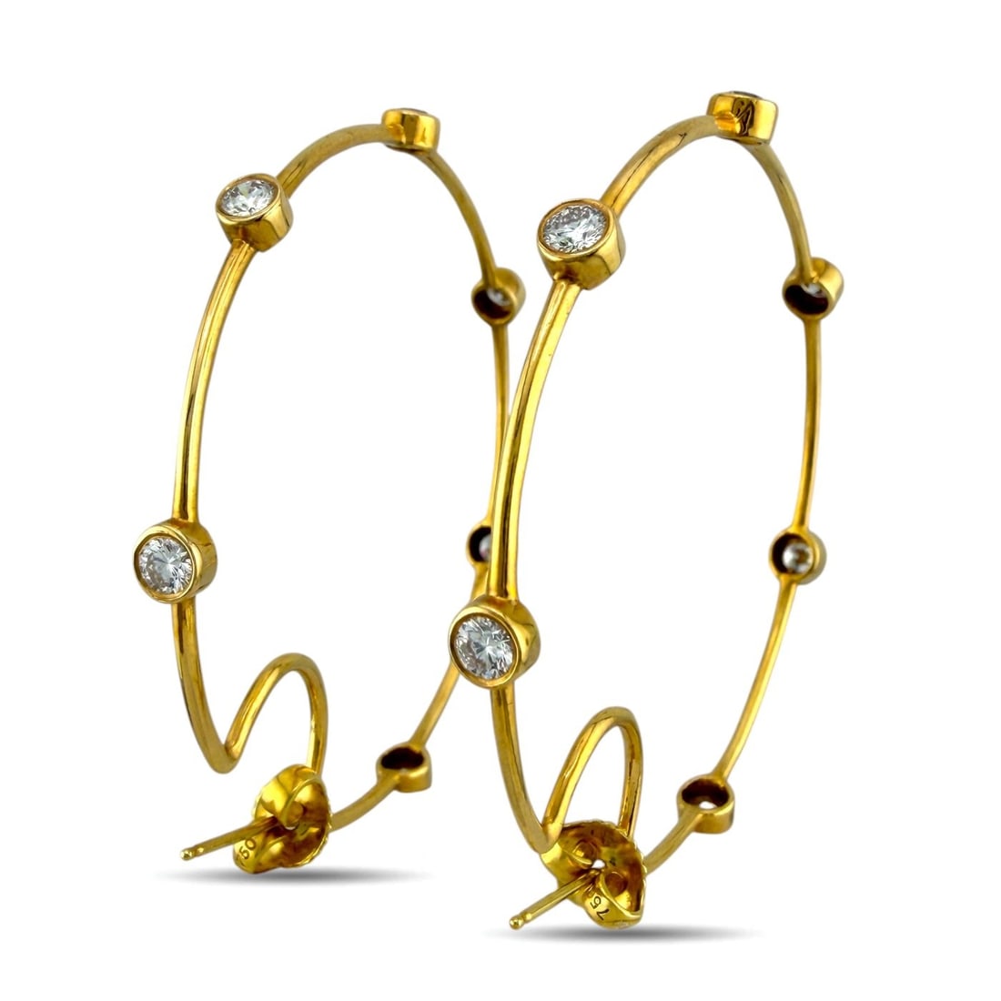 18K Yellow Gold 1.70ct Diamond Hoop Earrings: 18K Yellow Gold 1.70ct Diamond Hoop Earrings A refined pair of yellow gold hoop earrings designed with diamond accents for a bright and elegant look. The classic hoop silhouette gives the earrings tim