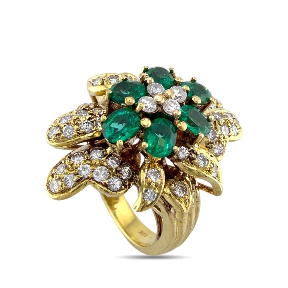 18K Yellow Gold 0.84ct Diamond and Emerald Cluster 2.64ct Ring: 18K Yellow Gold 0.84ct Diamond and Emerald Cluster Ring This exquisite 18K yellow gold ring features a dazzling center of small diamonds, elegantly framed by 6 vibrant emeralds. The emeralds are furth