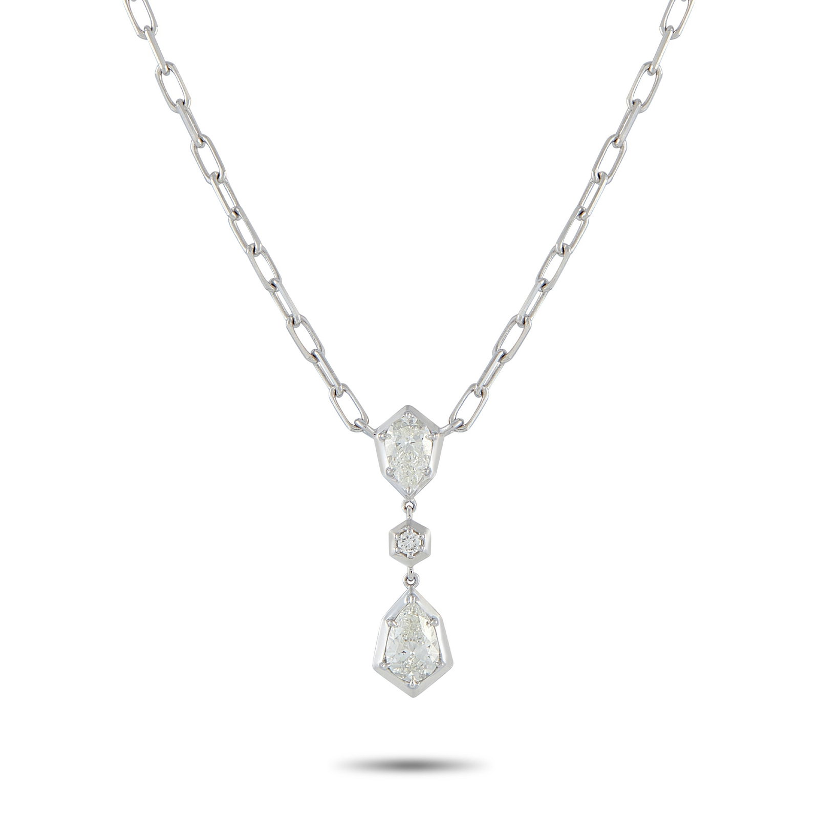 18K White Gold 1.32 ct Diamond Necklace: Geometry leads the design, with every stone in this necklace positioned to reinforce its bold look. A pear-shaped diamond, set on four prongs, rests on an angular white gold frame with its pointed end