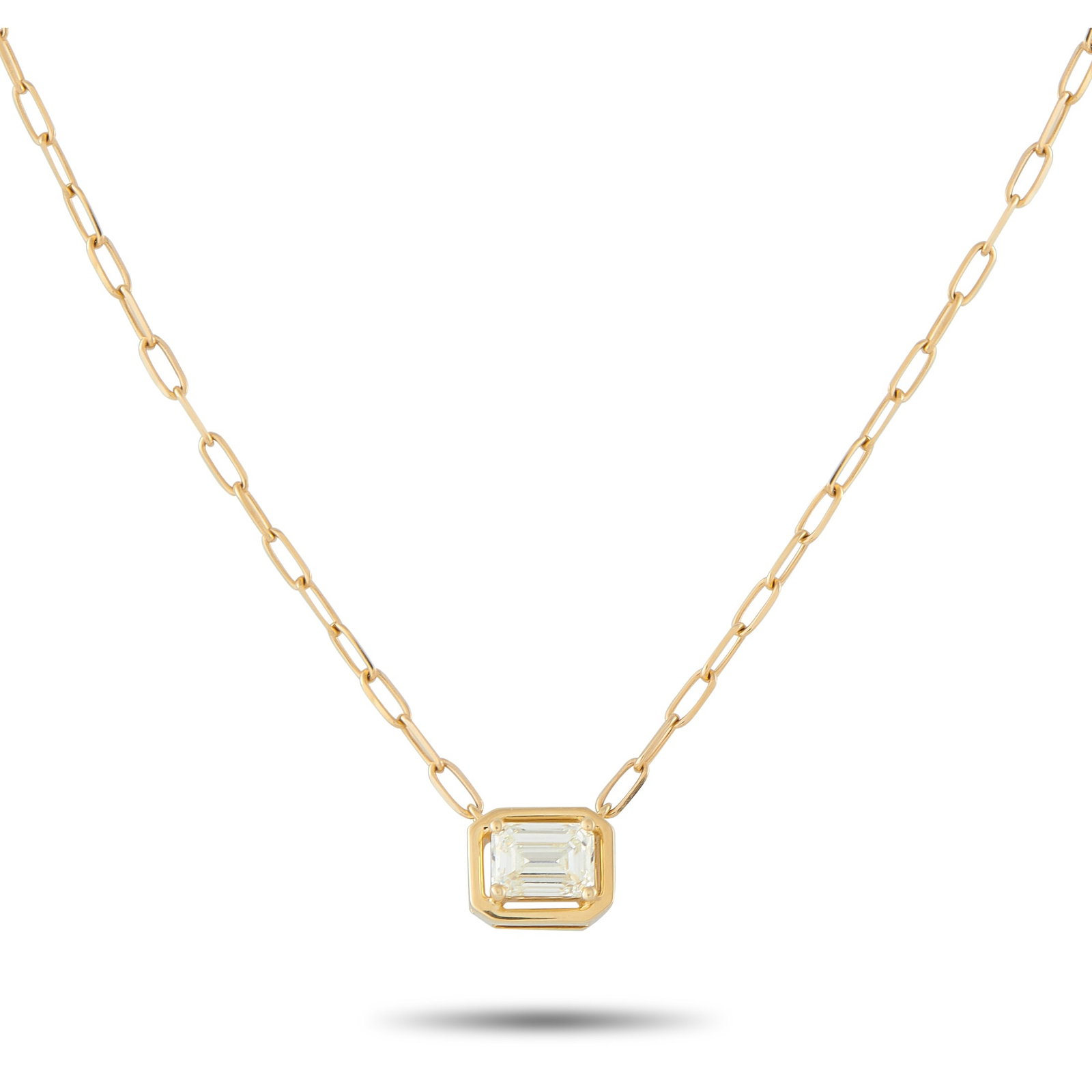 18K Yellow Gold 0.75ct Diamond Necklace: An 0.75 carat Diamond makes a statement on this simple, elegant necklace. Set in 18K Yellow Gold, the pendant measures 0.32” long by 0.38” wide and is suspended from a 15” paperclip 