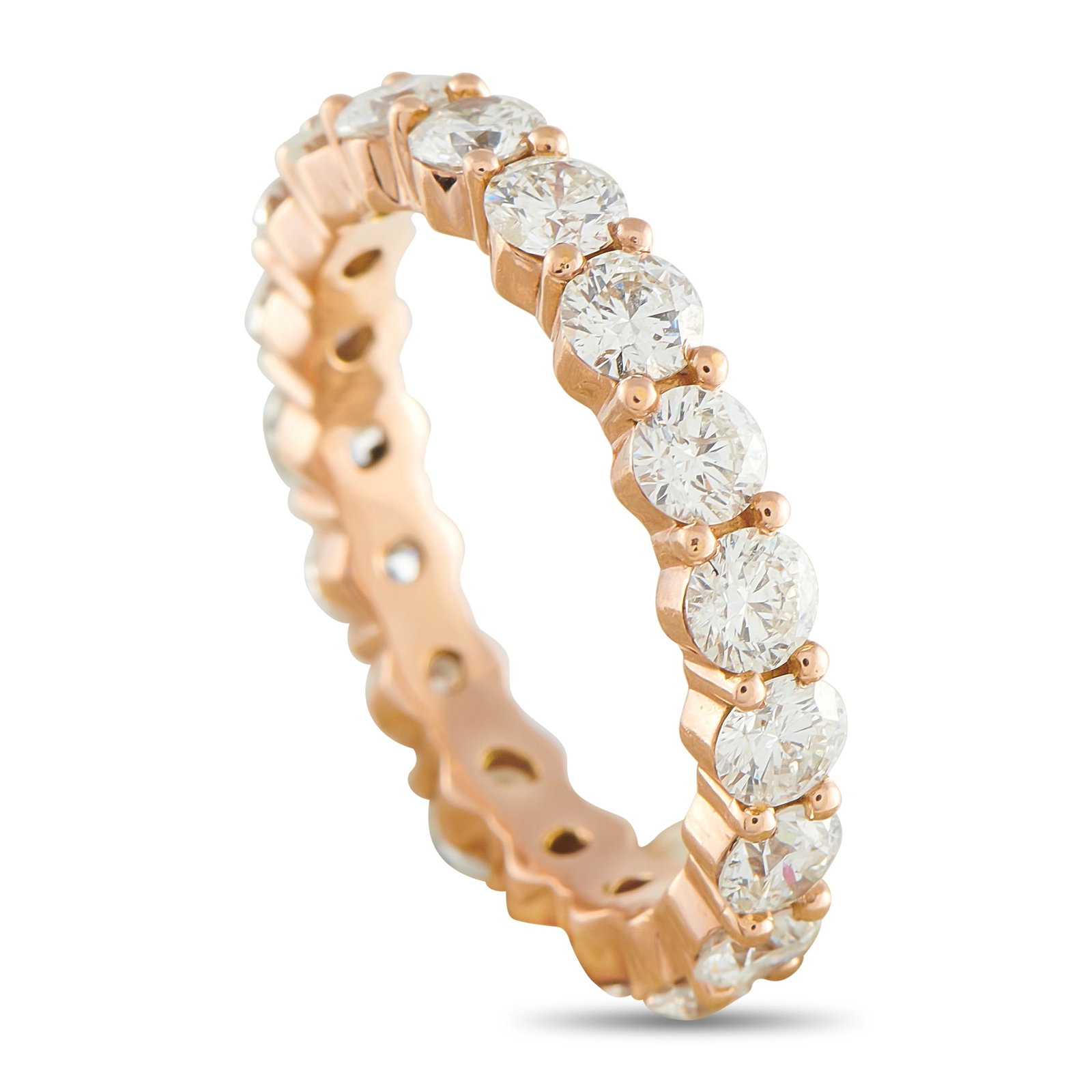 14K Rose Gold 4.40ct Diamond Eternity Band: Round-cut Diamonds with a total weight of 4.40 carats make this eternity band ring the perfect addition to any stacked set. Simple and elegant, opulent 14K Rose Gold adds subtle warmth to the overall 