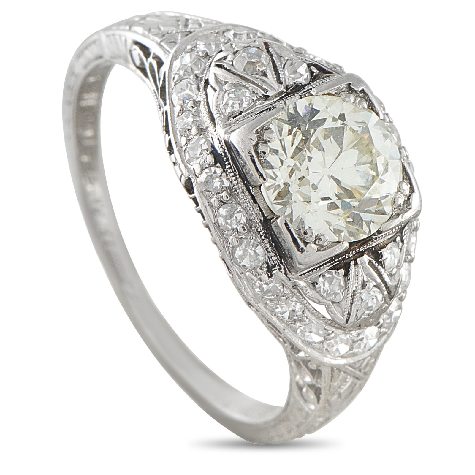 Platinum 1.35ct Diamond Edwardian Ring: An elegant blend of Edwardian craftsmanship and early Art Deco influence, this platinum ring shows the transition between two design movements with unusual clarity. Delicate lace-like openwork beneath