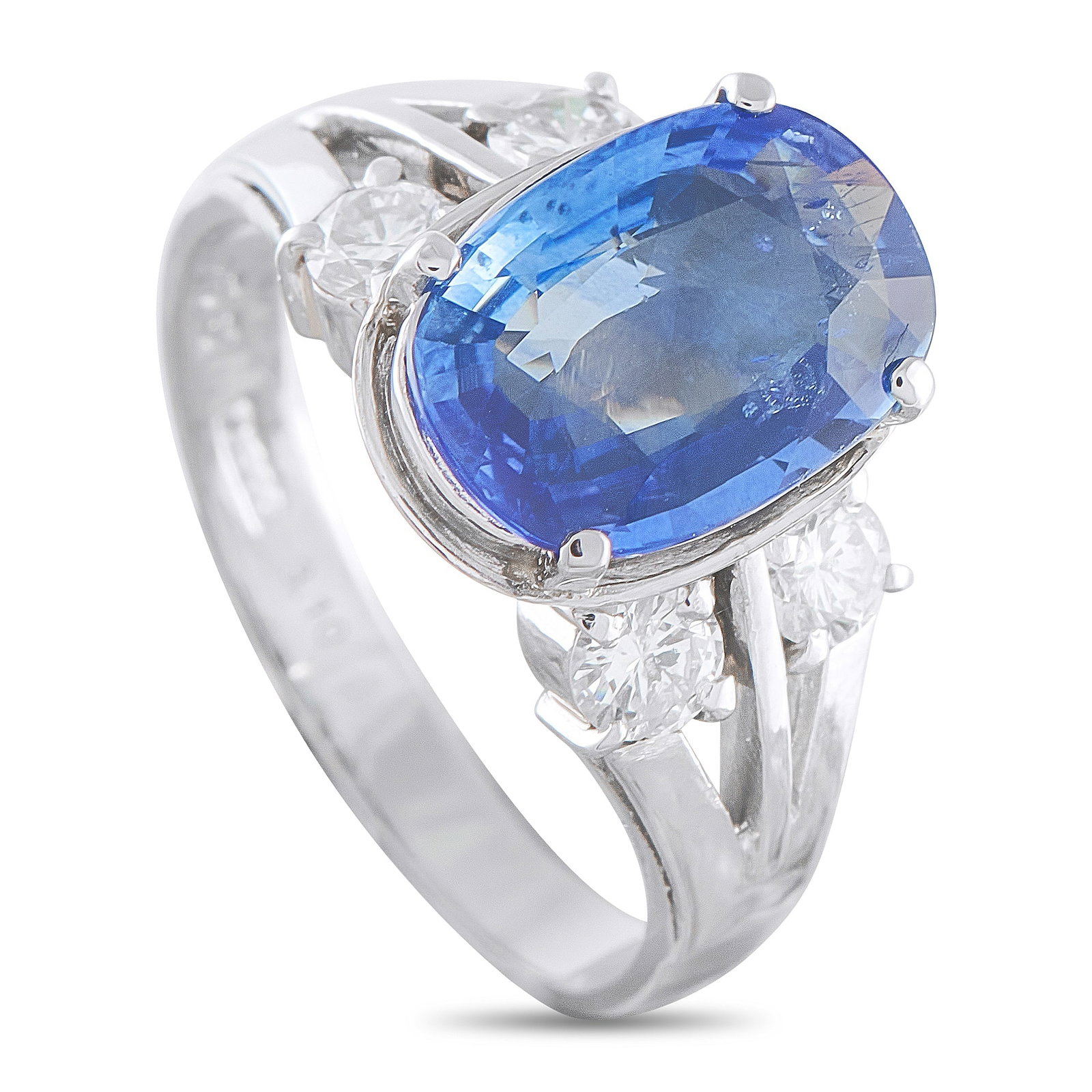 Platinum 0.55ct Diamond and Sapphire Ring: A stunning 4.18 carat Sapphire makes a statement at the center of this exquisite ring. Set in Platinum, Diamonds with a total weight of 0.55 carats add extra elegance to the overall design. It feature
