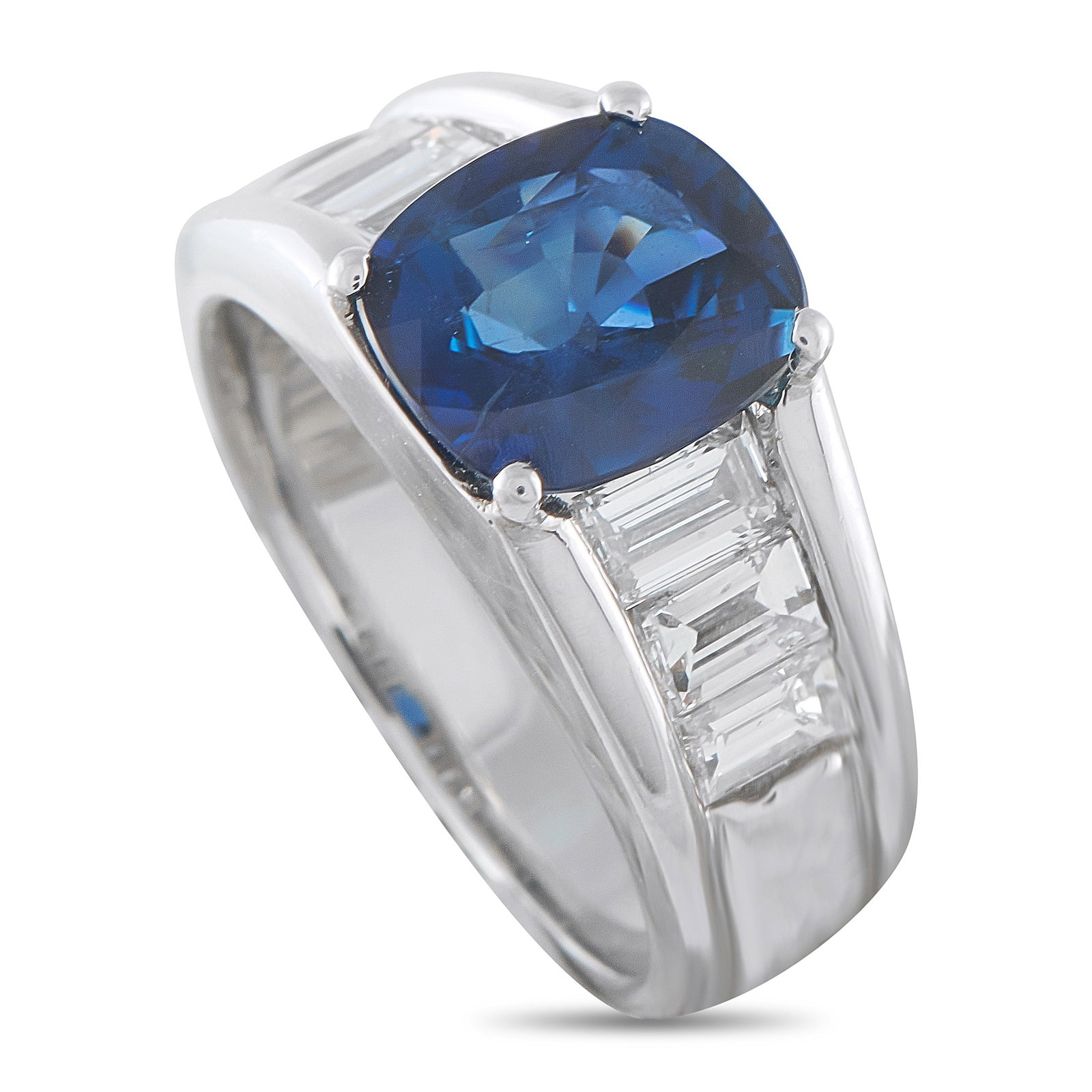 Platinum 1.54ct Diamond and Sapphire Ring: A sleek, sophisticated design makes this luxury ring simply unforgettable. Set in Platinum, the 3.61 carat oval-cut Sapphire is elevated by Diamond accents totaling 1.54 carats. It features a 4mm wide