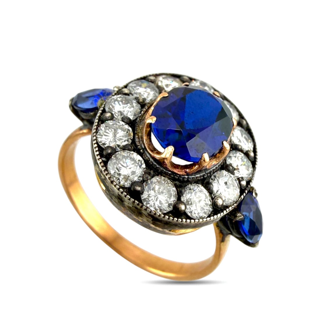K. Faberge Imperial Russian 56 Rose Gold 1.00ct Diamond and 1.90ct Sapphire Ring: K. Faberge Imperial Russian 56 Rose Gold 1.00ct Diamond and 1.90ct Sapphire Ring This Imperial Russian ring is crafted in 14K rose gold, equivalent to the traditional 56 zolotnik gold standard. The ri