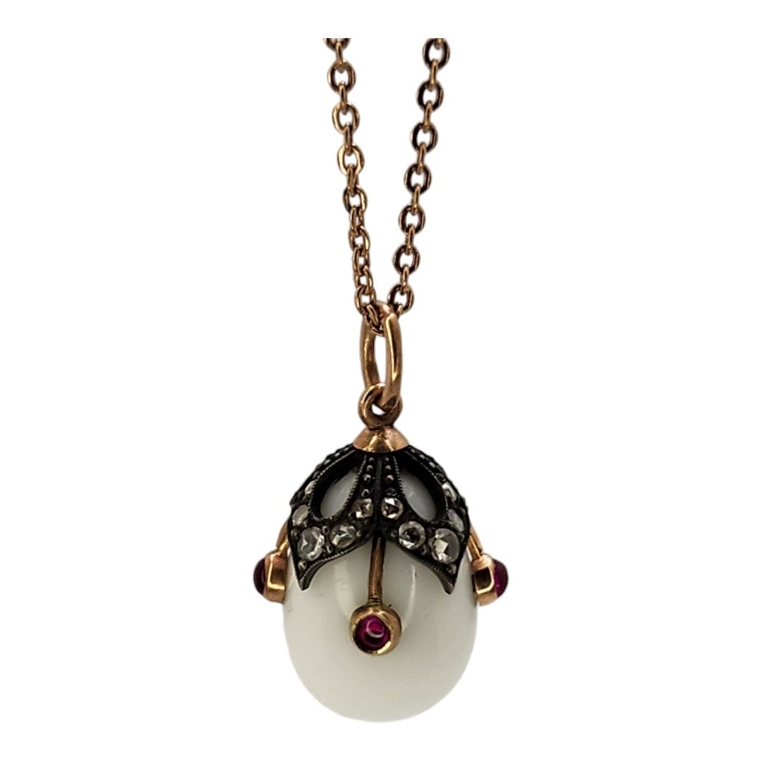 K. Faberge Imperial Russian 56k (14k) Gold & Diamond Egg Pendant Circa 1890: A Fabergé jewelled gold & Diamond egg pendant St Petersburg, 1890 Marked:Yes. initials K.F for Karl Faberge Material: Gold 56 assay value Sizes: 2.1cm Weight: 5 grams Period: 1890 Condition : Very Go