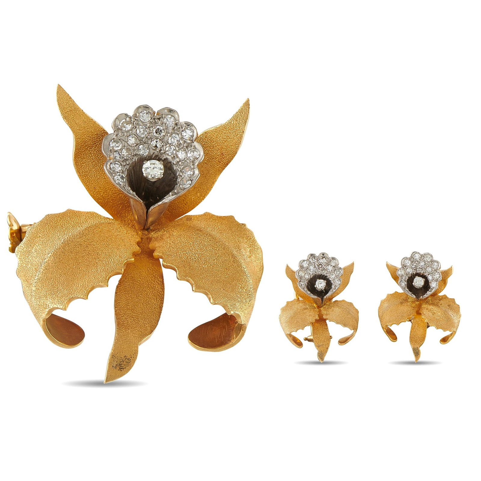 18K Yellow Gold 0.95ct Diamond Orchid Brooch: A charming estate 18K yellow gold three-piece orchid suite comprising a pendant-brooch and a pair of matching earrings, each depicting a naturalistic orchid blossom with florentine-textured yellow gol