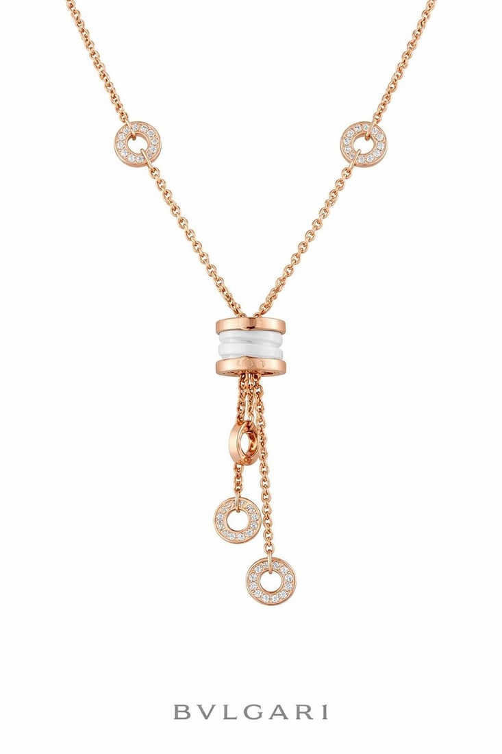 Bvlgari B.zero1 18K Rose Gold Diamond and White Ceramic Tassel Lavalier Necklace: BVLGARI B.zero1 18K Rose Gold Diamond and White Ceramic Tassel Lavalier Necklace Like all pieces from this iconic collection, the Bvlgari B.Zero1 Tassel Lavalier necklace defies tradition while recall