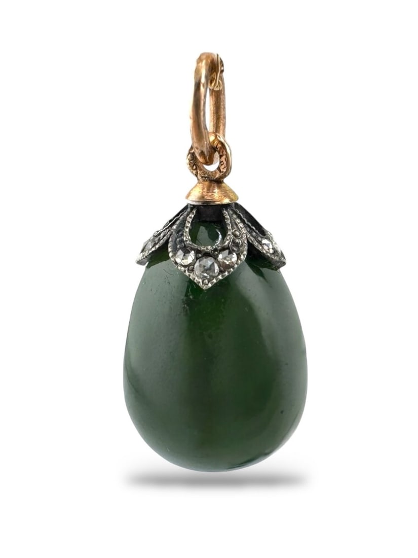 Imperial Russian Period Green Enamel Egg Pendant with Diamonds: Faberge Imperial Russian Green Enamel Egg Pendant with Diamonds An exquisite Imperial Russian egg pendant from the House of Faberge, crafted in 56K gold and decorated with vibrant green guilloche enam