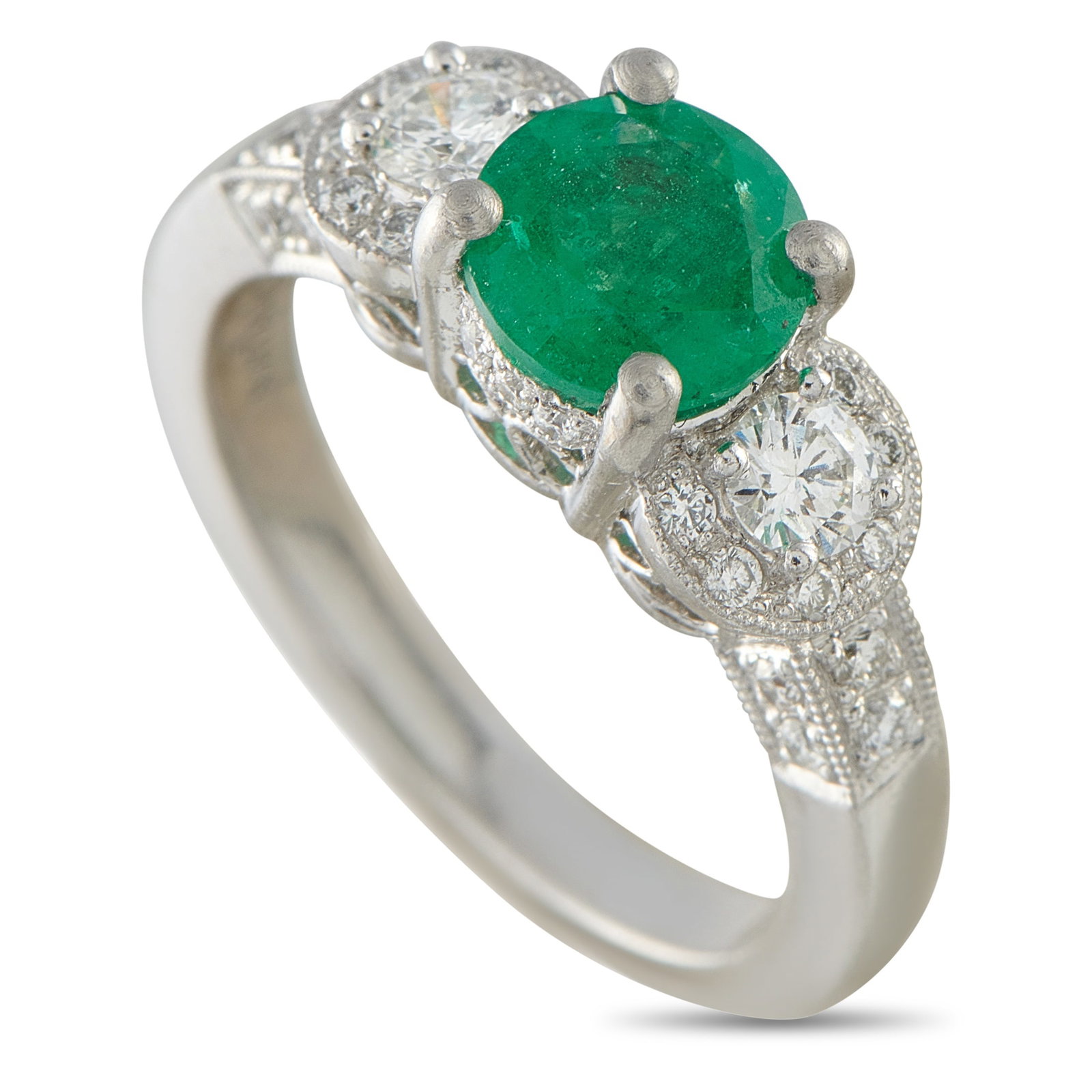 Platinum 0.56ct Diamond and Emerald Ring: The symbolism long attached to emeralds, particularly renewal, loyalty, and protection, lends this ring a more personal significance. This platinum piece carries a 1.10-carat round emerald elevated in