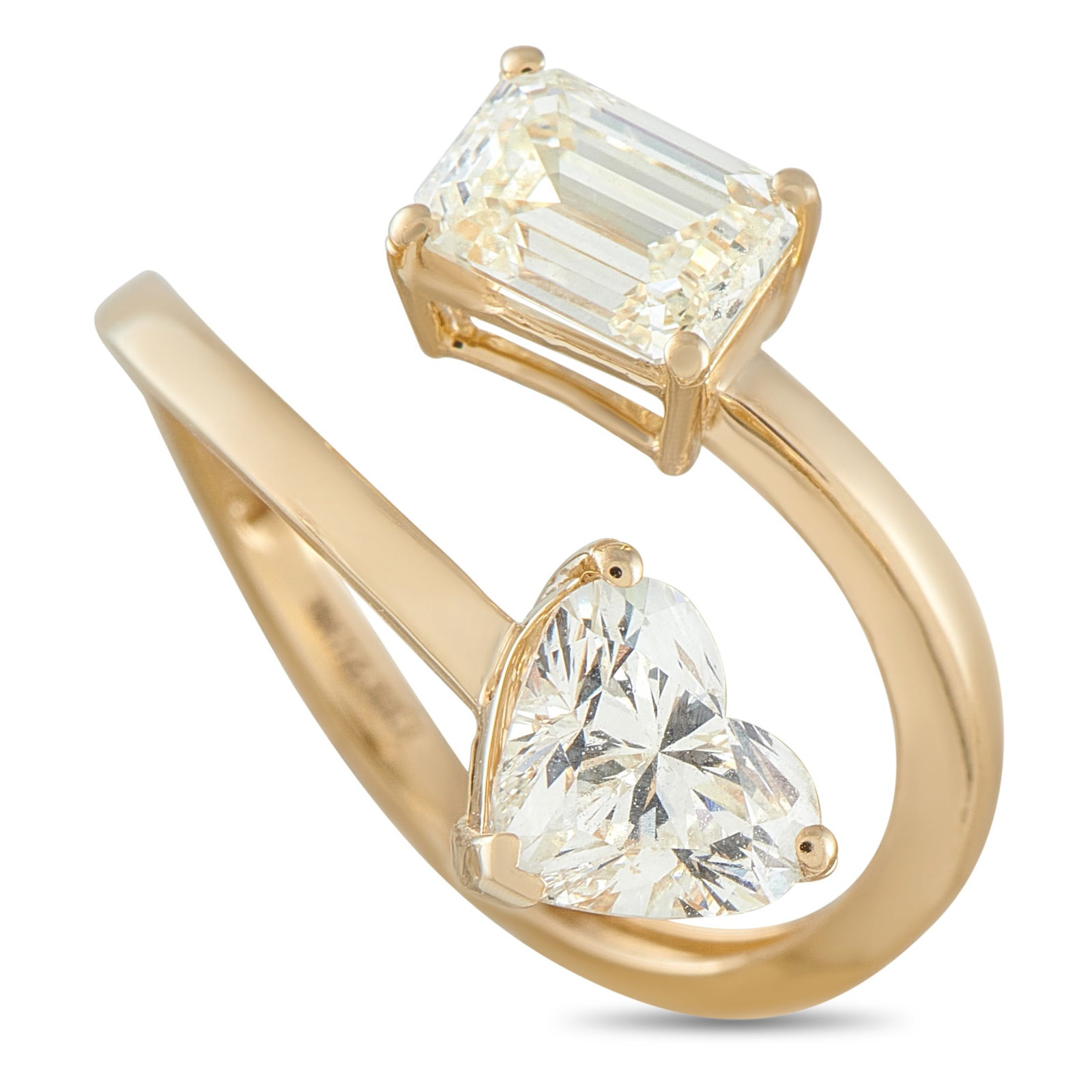 18K Yellow Gold 2.0ct Diamond Bypass Ring: A playful design makes this bypass ring endlessly charming. At one end of the delicate 18K Yellow Gold setting, you’ll find a 1.0 carat heart-shaped Diamond with J color and VVS2 clarity. A 1.0 cara
