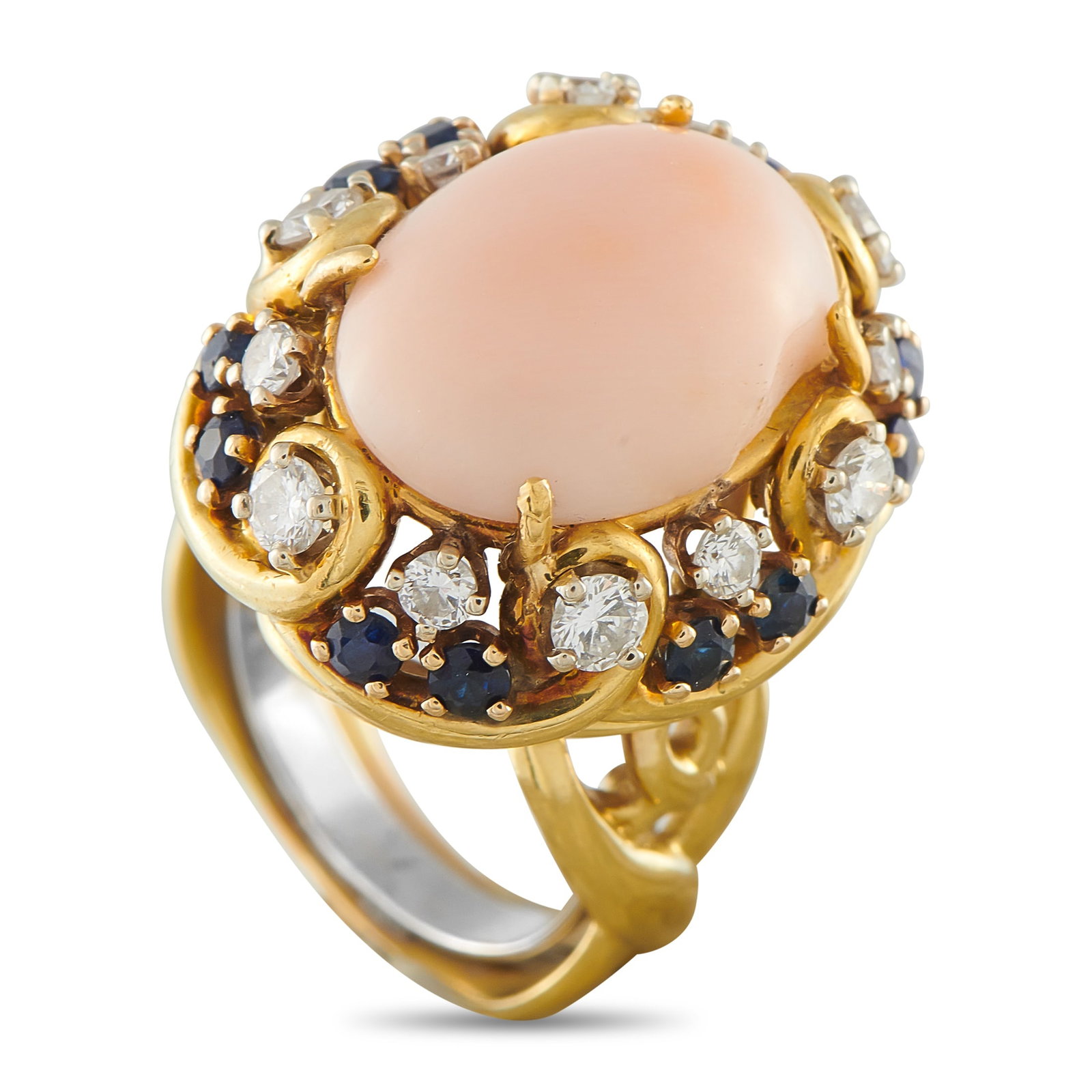 18K Yellow Gold 0.80ct Diamond, Coral, and Sapphire Ring: This ring is a romantic piece that will add a subtle touch of color and sparkle to any ensemble. An intricate 18K Yellow Gold setting and a blush colored Coral center stone provide this piece with a d