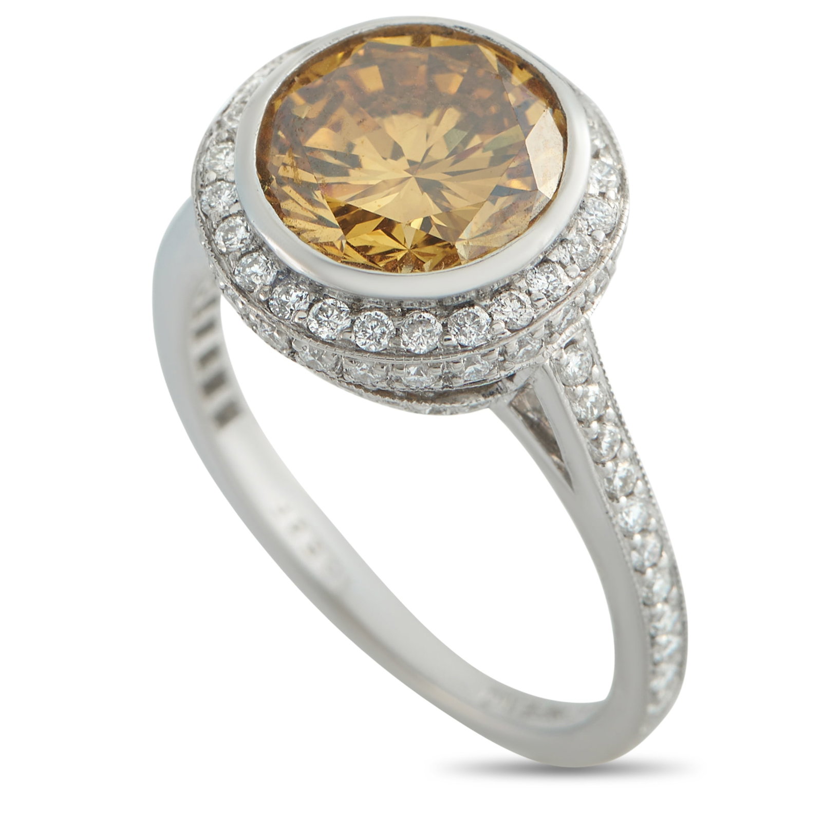 Platinum 3.65ct Diamond Ring: A 3.0 carat colored Diamond makes a statement at the center of this elegant luxury ring. Incredibly radiant, the Platinum setting shines brightly from every angle thanks to inset Diamond accents total
