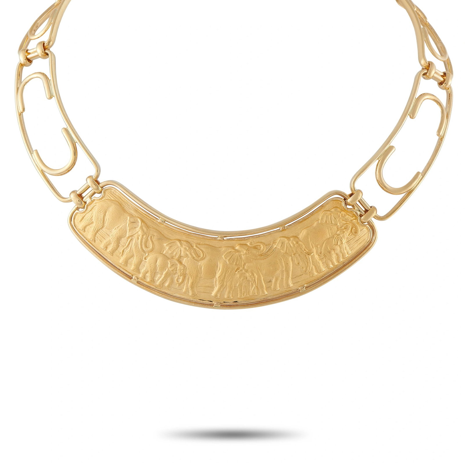 Carrera Y Carrera 18K Yellow Gold Elephant Necklace: Intricate metalwork makes this Carrera Y Carrera necklace bold and incredibly impressive. At the center, elephant imagery adds additional style and sophistication to the overall design. This piece is 