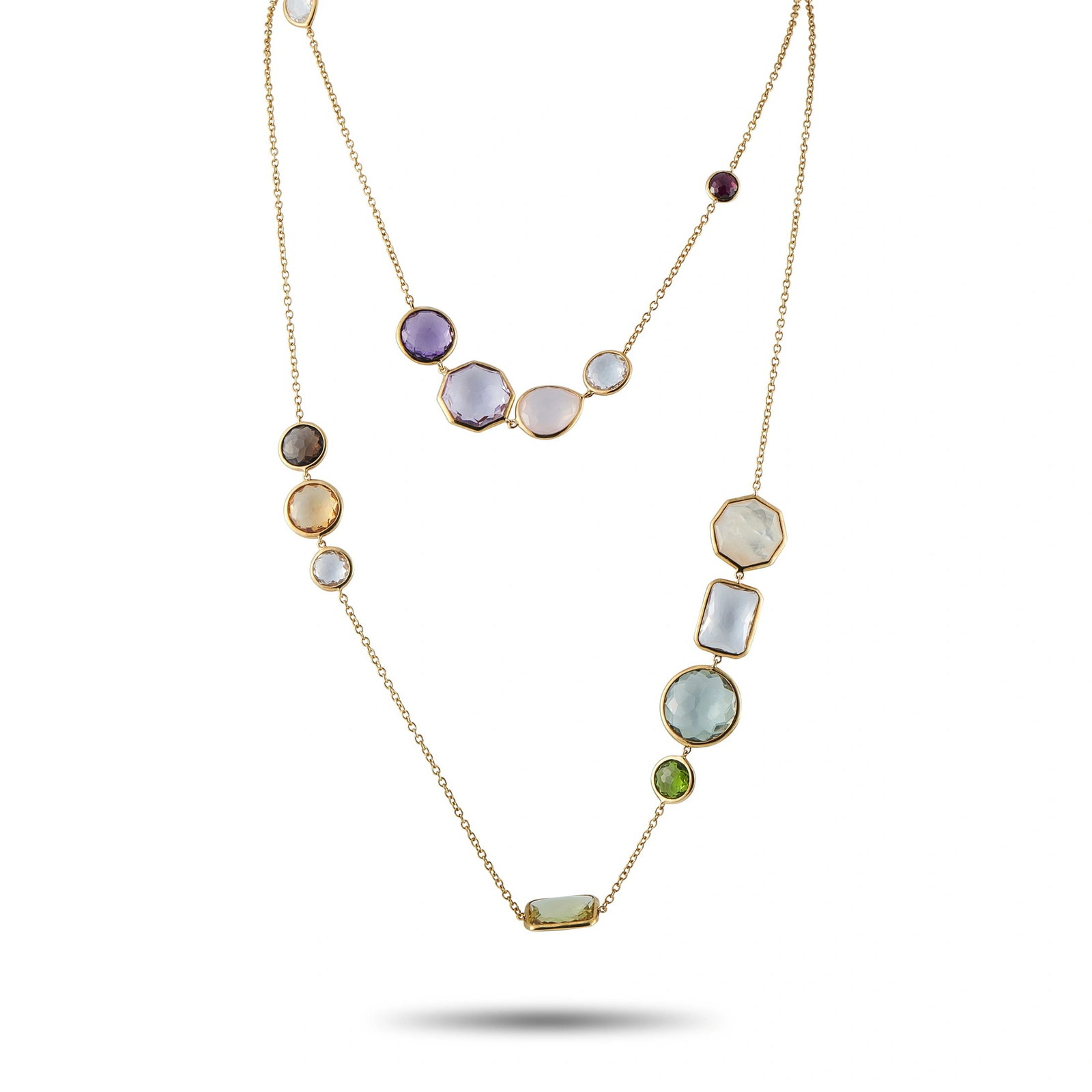 Ippolita 18K Yellow Gold Multi-Gemstone Necklace: This playful Ippolita necklace is designed to make a statement. The dramatic 43” chain comes to life thanks to vibrant multicolored gemstones, which feature unique shapes, colors, and textures. 