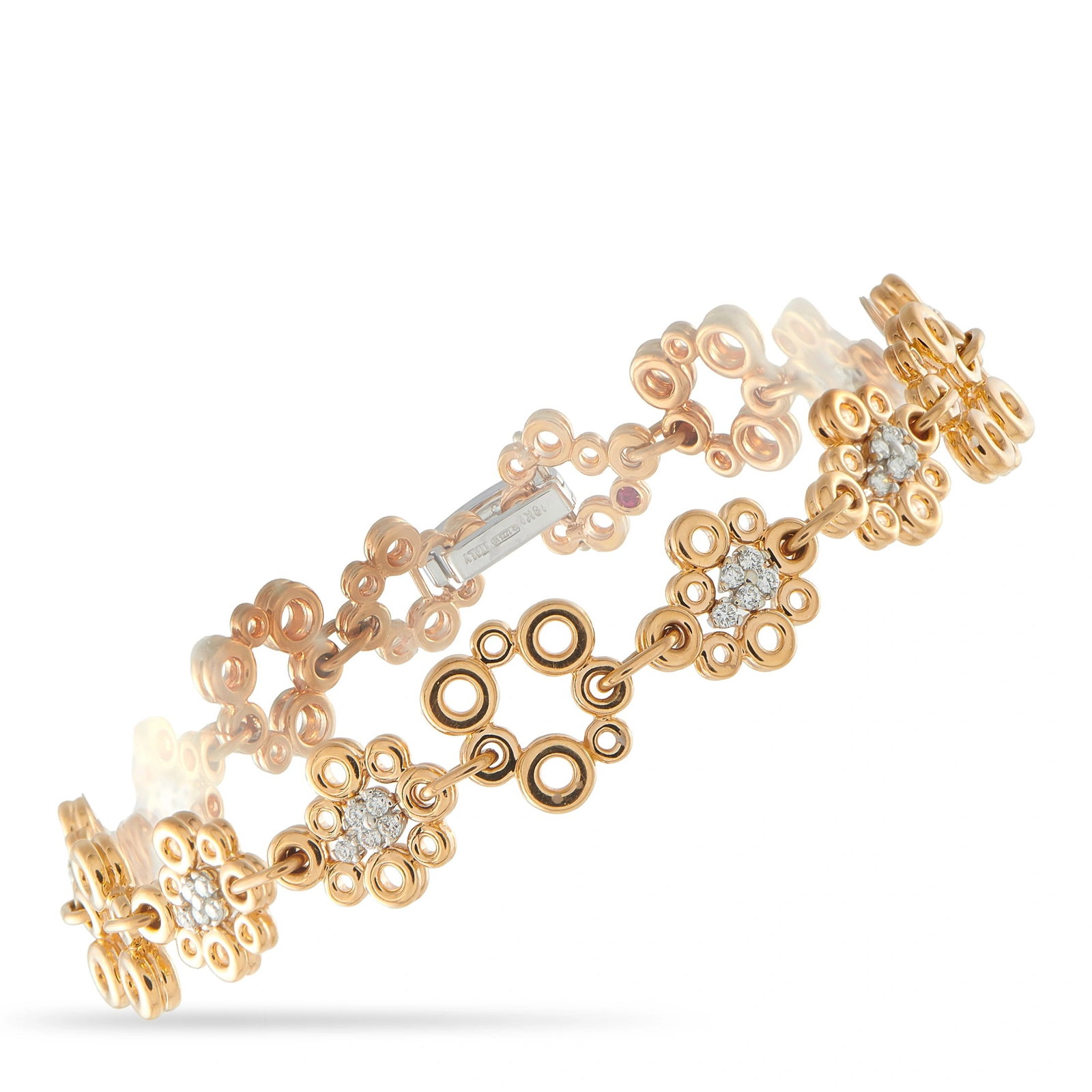 Roberto Coin 18K Rose Gold 0.45ct Diamond Bracelet: This Roberto Coin bracelet is an intricate piece with obvious charm. Crafted from 18K Rose Gold, circular motifs beautifully complement the sparkling Diamond accents totaling 0.45 carats. It measures 