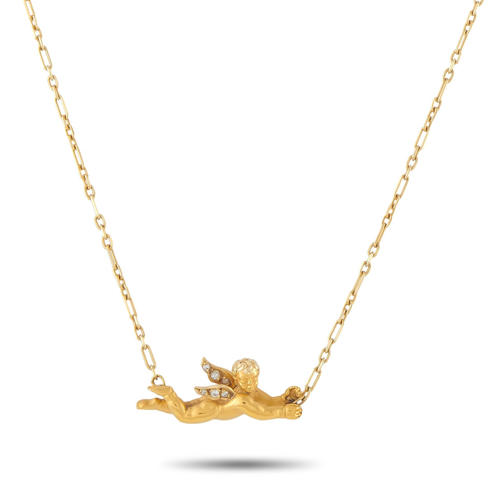 Carrera Y Carrera 18K Yellow Gold Flying Angel Necklace: A sculptural tour de force from Carrera y Carrera, Spain’s legendary jeweler founded in Madrid in 1885, this 18K yellow gold necklace centers on a high-relief flying putto rendered with extraordinar