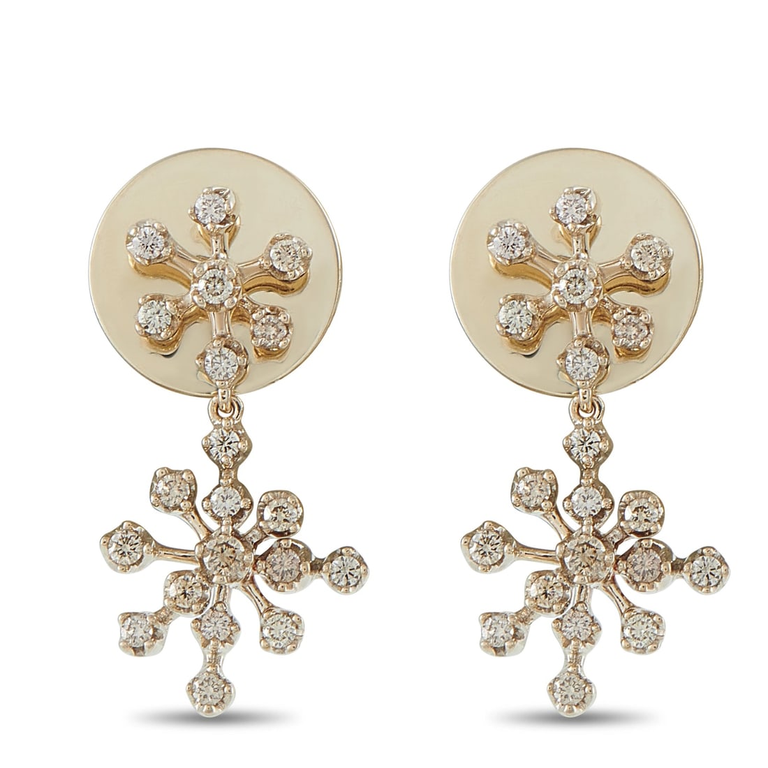 H. Stern 18K White Gold Diamond Snowflake Drop Earrings: This pair of H. Stern earrings is crafted in 18K white gold, each featuring a round button top set with a spray of pave round diamonds in a snowflake motif, suspending a matching diamond-set drop. The