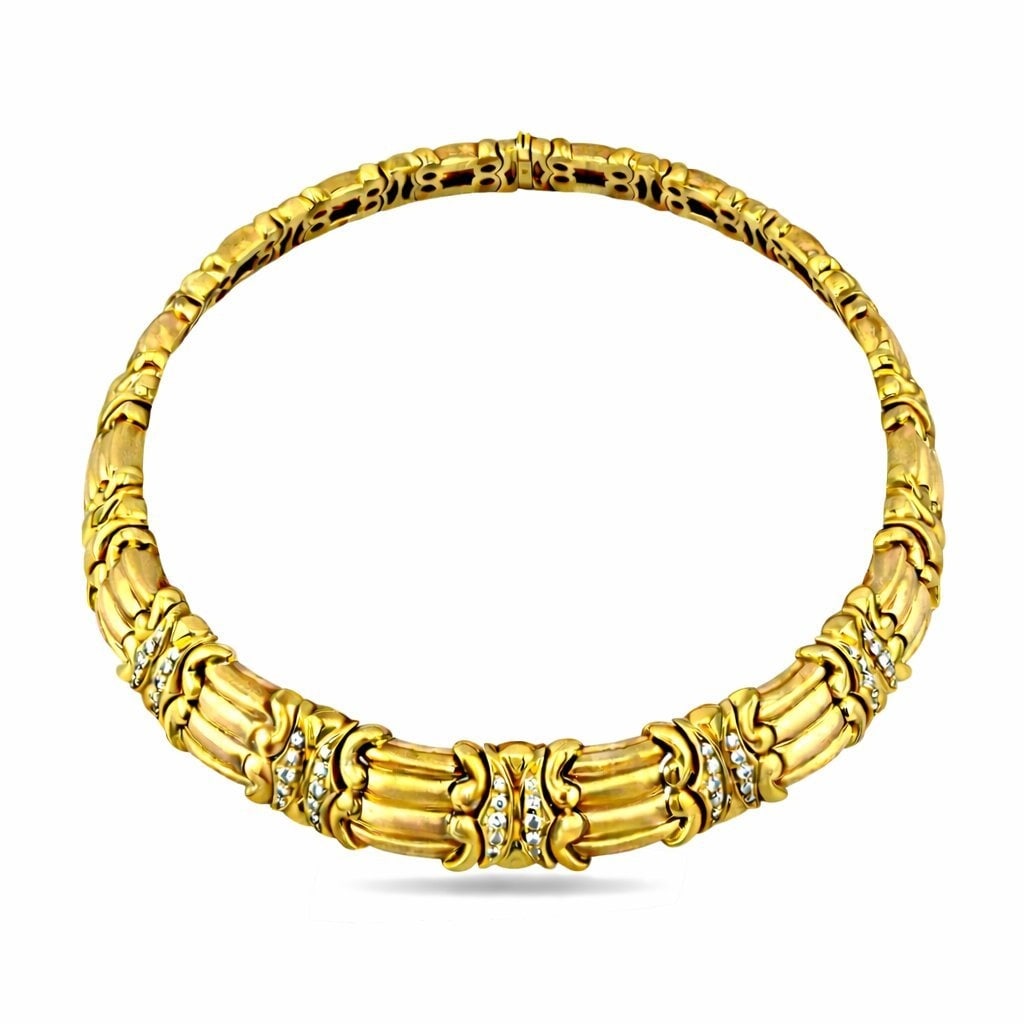 14K Yellow and Rose Gold 1ct Diamond Choker Necklace: 18K Yellow and Rose Gold 1ct Diamond Choker Necklace A bold and substantial choker necklace crafted in alternating rows of 18 karat yellow and rose gold that interlock seamlessly, creating a dynamic w