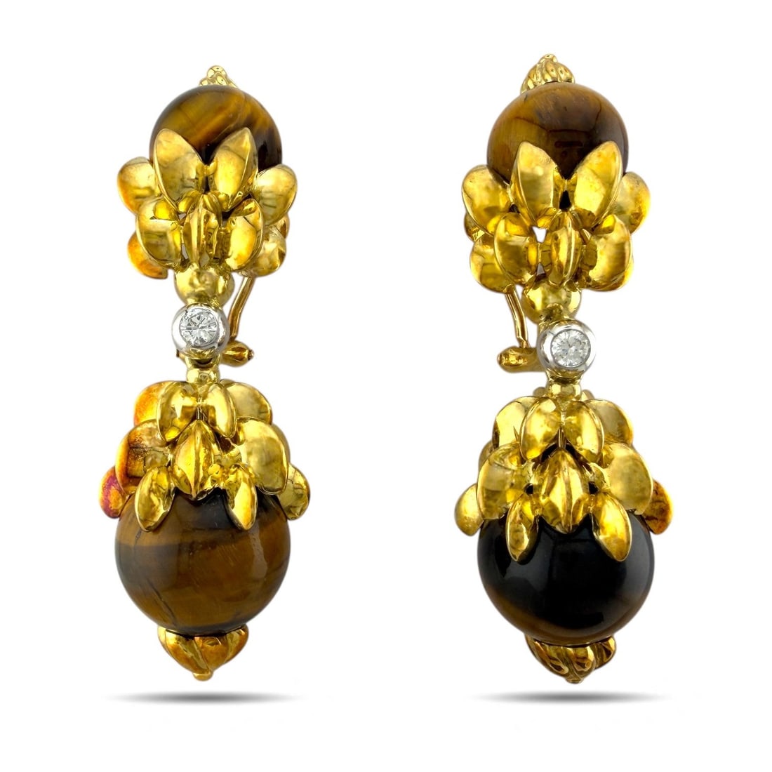 14K Yellow Gold Carved Wood and 0.28ct Diamond Earrings: 14K Yellow Gold Carved Wood and 0.28ct Diamond Earrings A striking antique pair of 14K yellow gold earrings featuring polished carved wooden spheres, artistically suspended within sculpted gold settin