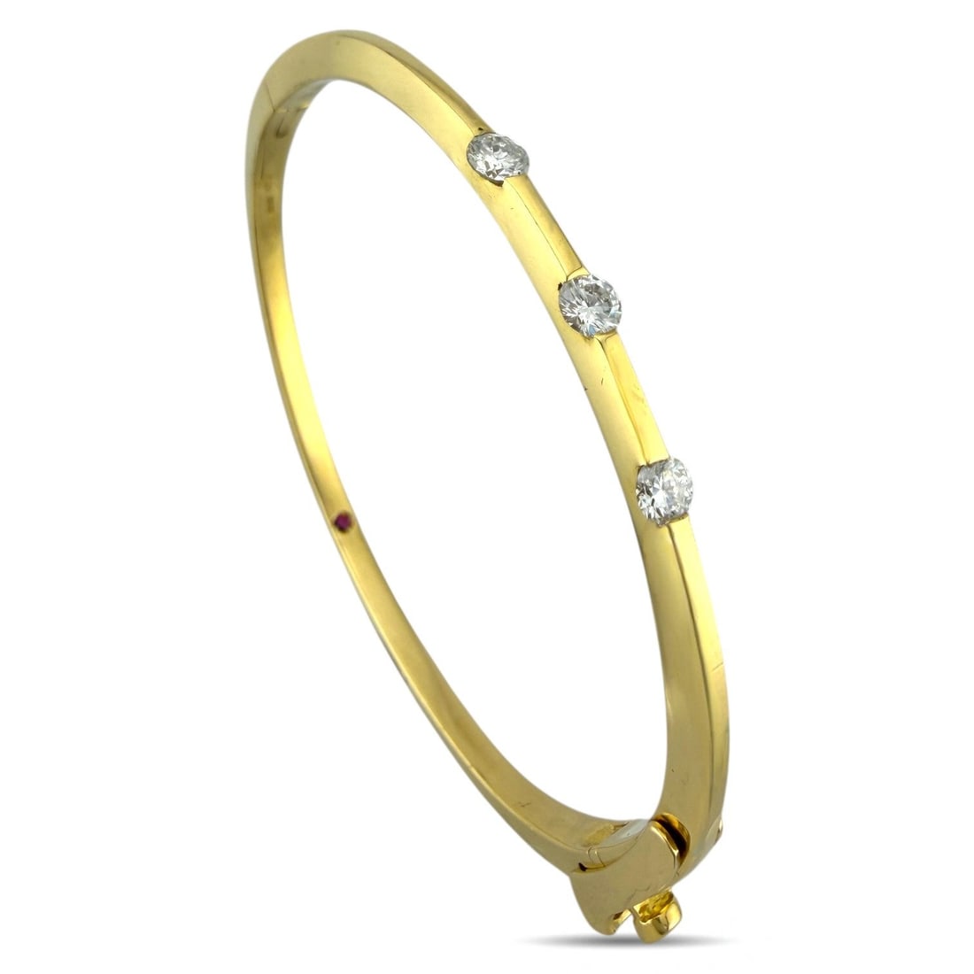 Roberto Coin 18K Yellow Gold 0.45ct Diamond and Ruby Hinged Bracelet: Roberto Coin 18K Yellow Gold 0.45ct Diamond and Ruby Hinged Bracelet This refined Roberto Coin bracelet is crafted in rich 18 karat yellow gold and designed with a sleek, polished silhouette that curv
