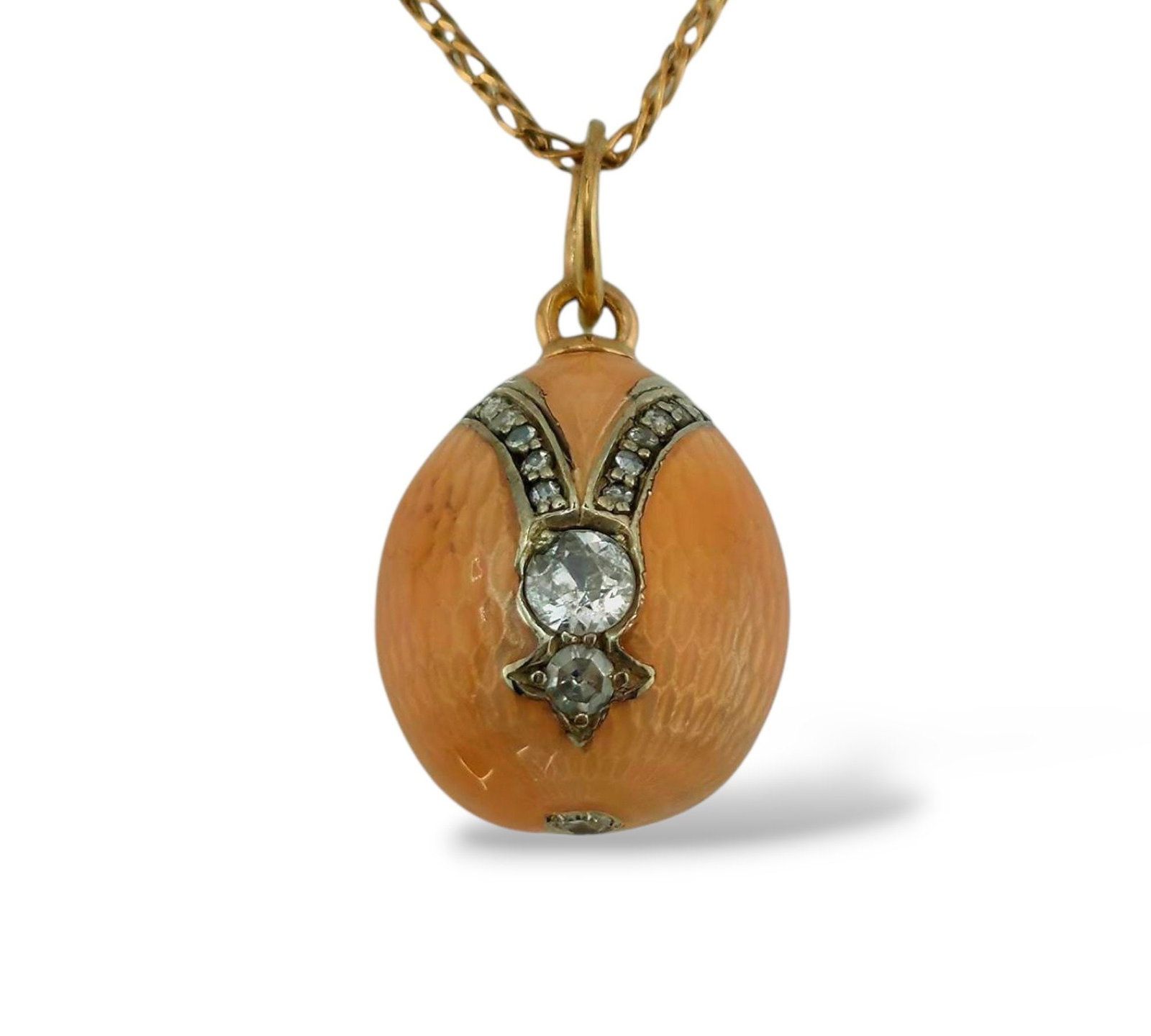 Imperial Russian Period 56K Gold Enamel and Diamond Egg Pendant: Imperial Russian 56k Gold Enamel and Diamond Egg pendant Rare Design Signed: Yes. Initials AG Marked: 56 for Imperial Russian 56k Gold Sizes: L. 2..20cm and Diameter 1.30cm Weight: 5.0 Grams Condition