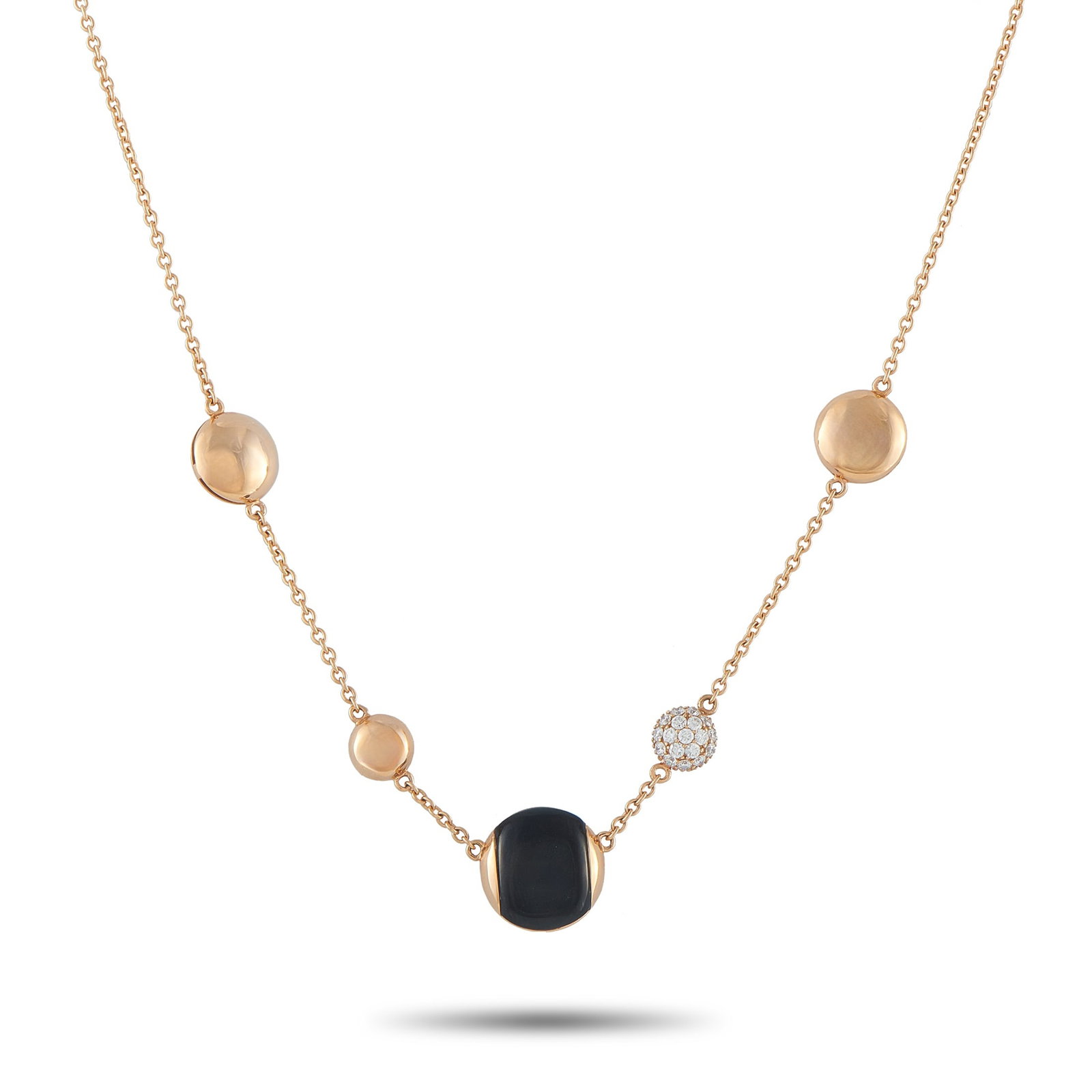 Roberto Coin 18K Rose Gold Diamond and Onyx Necklace: This Roberto Coin necklace is incredibly chic. The sleek, contemporary design comes to life thanks to a stylish asymmetrical design. An Onyx stone makes a statement at the center, while Diamond accent