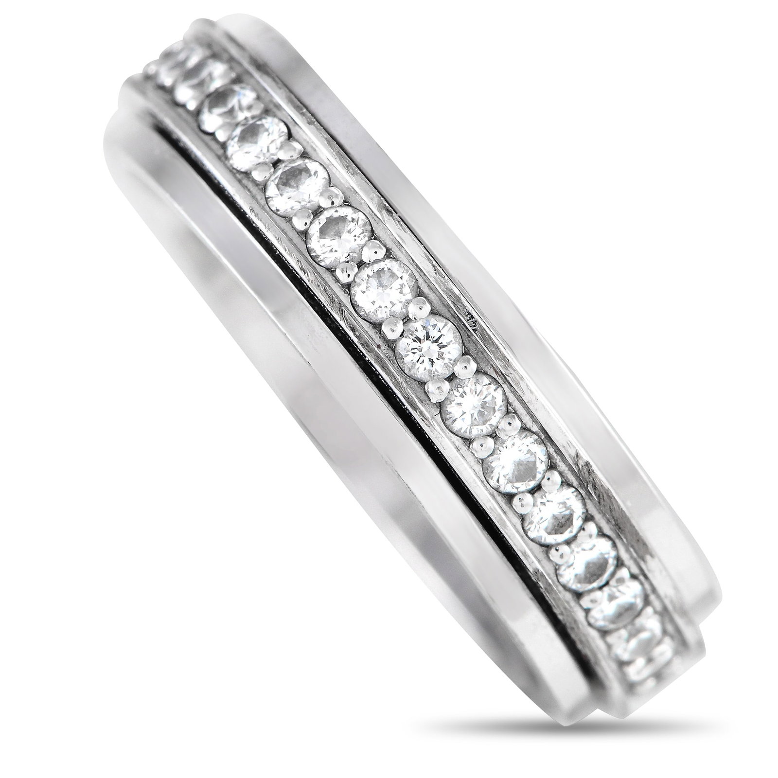 Piaget Possession 18K White Gold 0.24ct Diamond Ring: A captivating ring of extraordinary style, here is Piaget’s Possession ring in white gold glittering with 0.24 carats of brilliant diamonds. This stylish ring features a central turning band that sh