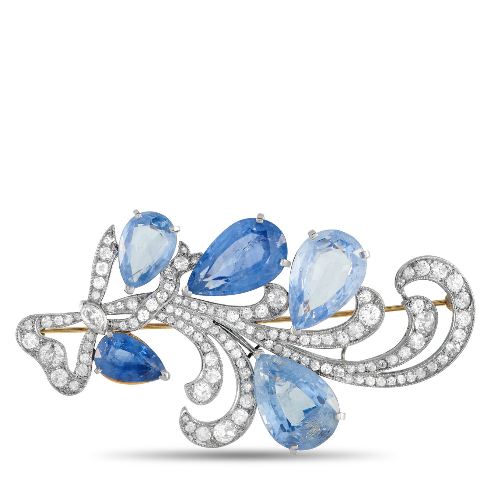 Platinum, 14K Rose Gold 2.20ct Diamond and Sapphire Brooch: This luxury brooch possesses a distinct sense of movement. The gracefully curved setting is crafted from a stunning combination of Platinum and 14K Rose Gold. Diamonds totaling 2.20 carats elevate the