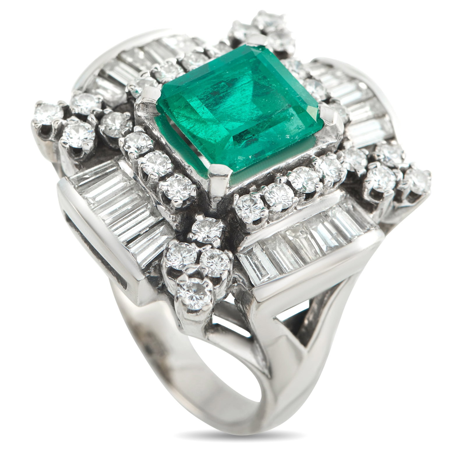 18K White Gold 2.70ct Diamond and Emerald Ring: An opulent design makes this luxury ring truly timeless. At the center, a 3.10 carat Emerald gemstone provides a striking pop of color. It’s surrounded by Diamond accents totaling 2.70 carats, which