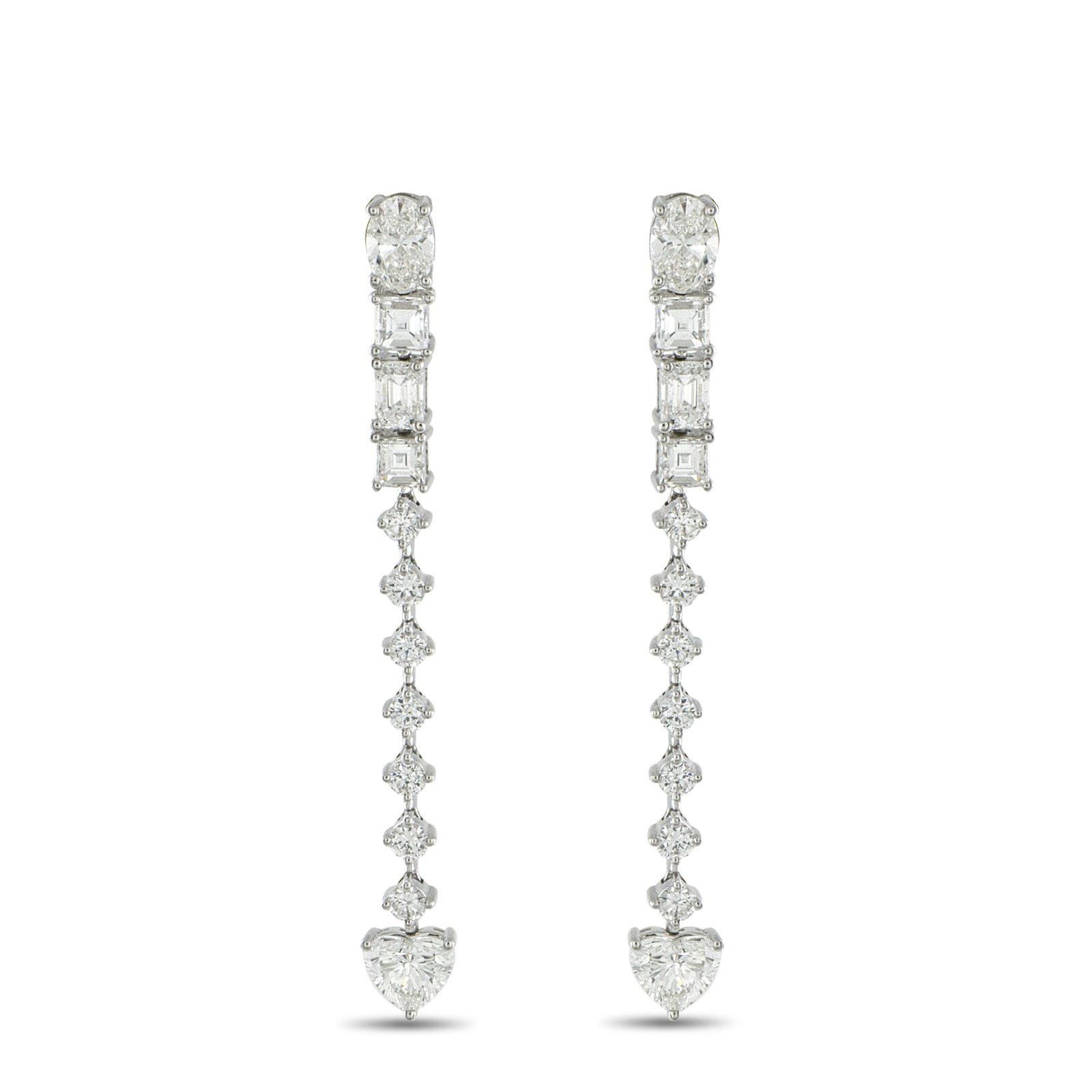 18K White Gold 3.95ct Diamond Dangle Earrings: Geometry meets romance in these 18K white gold dangle earrings. Like a story told in facets, these earrings begin with an oval diamond at the post. Step-cut diamonds mark the rhythm, followed by a ver