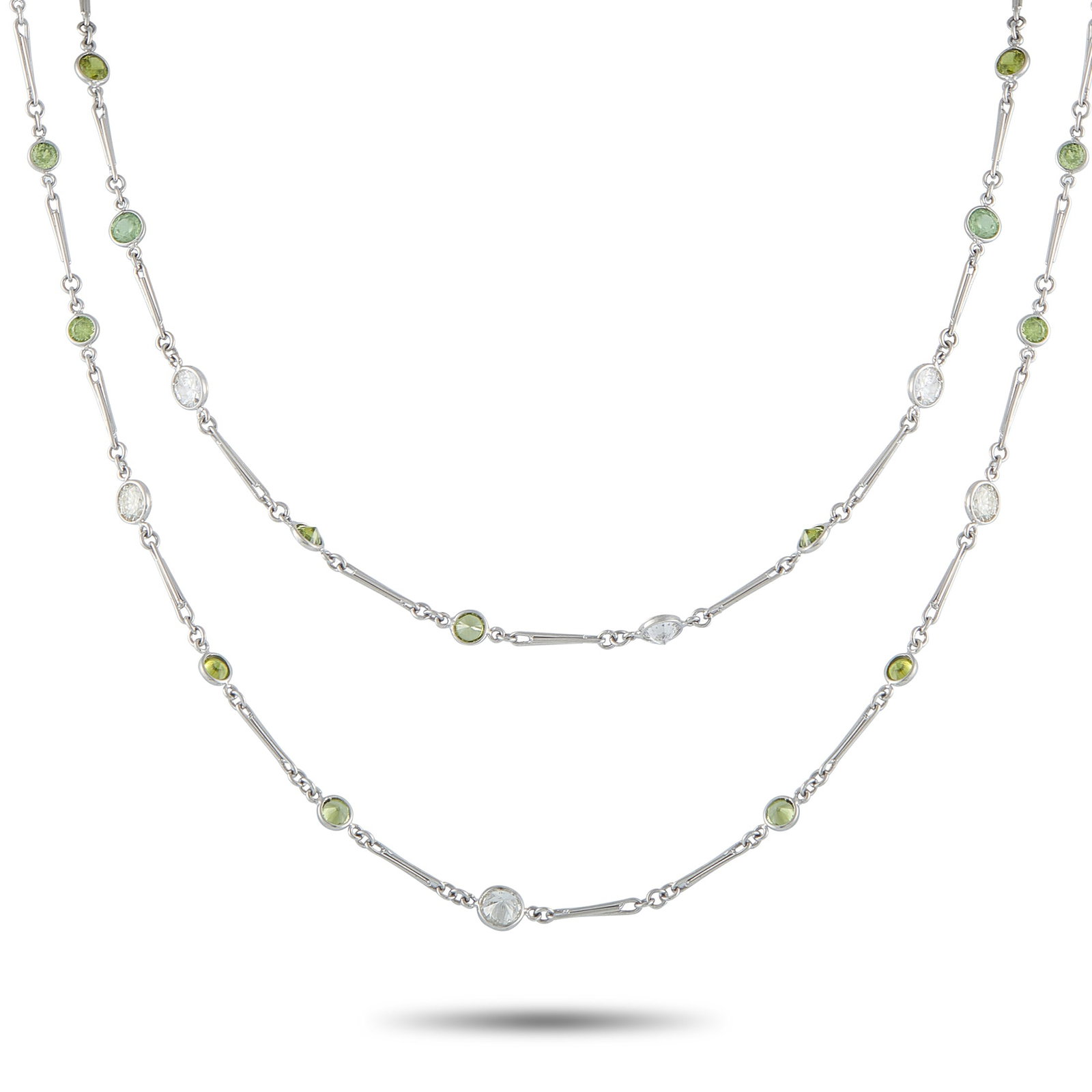 Platinum 7.13ct Diamond and Demantoid Necklace: Add charm and sophistication to any ensemble with this elegant necklace. Glittering green Demantoid with a total weight of 22.92 carats contrasts beautifully against this piece’s sleek Platinum sett