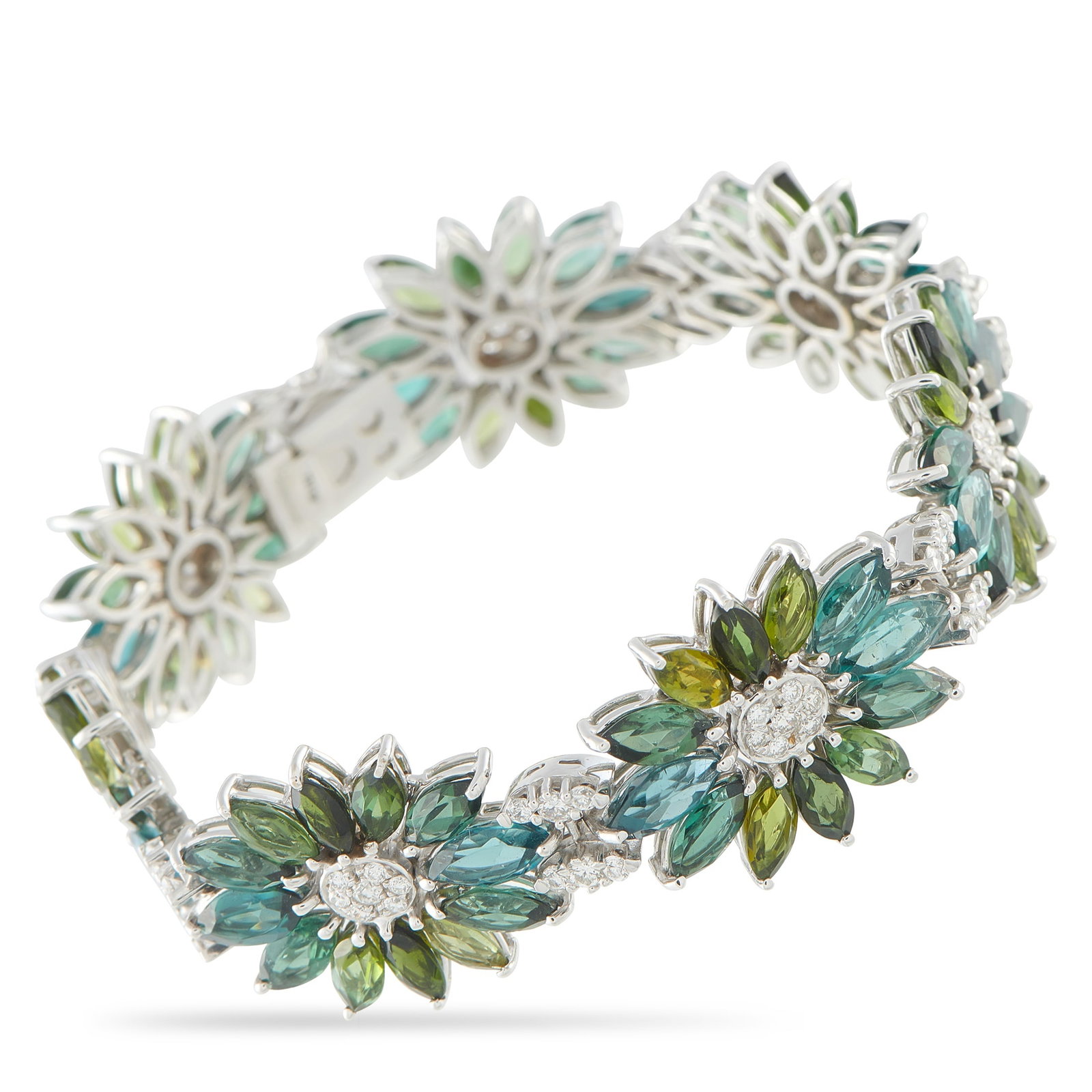 18K White Gold 2.10ct Diamond and Tourmaline Bracelet: A classically elegant design makes this luxury bracelet impossible to ignore. Colorful Tourmaline stones with a total weight of 22.0 carats elevate the breathtaking floral motifs. Diamonds with a tota