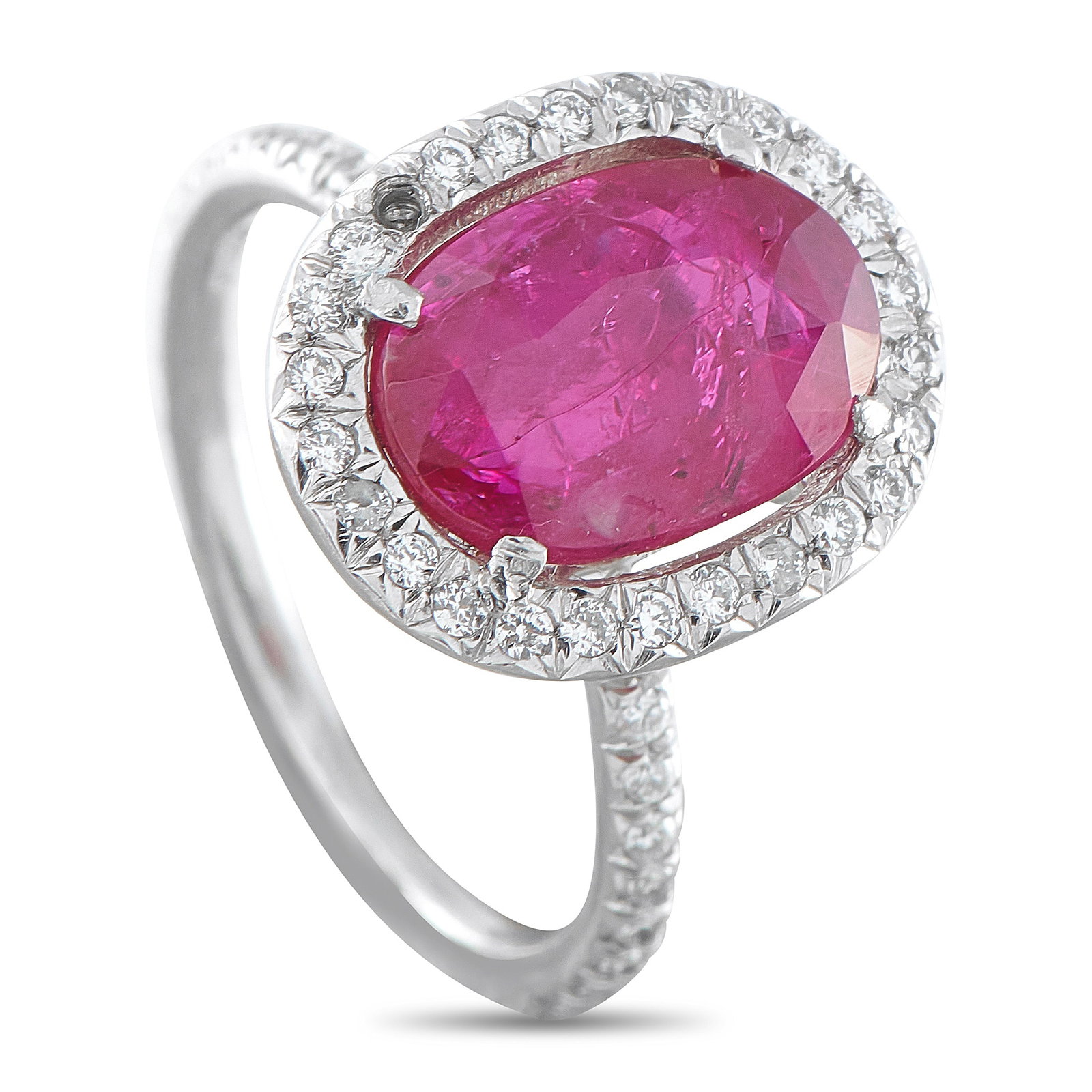Platinum 0.65ct Diamond and No-Heat Burmese Ruby Ring: Minimal in band width, generous at the crown. This ring balances delicacy with prominence. The slender 1mm shank is set with diamonds, supporting a 4.25-carat oval Burmese ruby certified as no heat. F