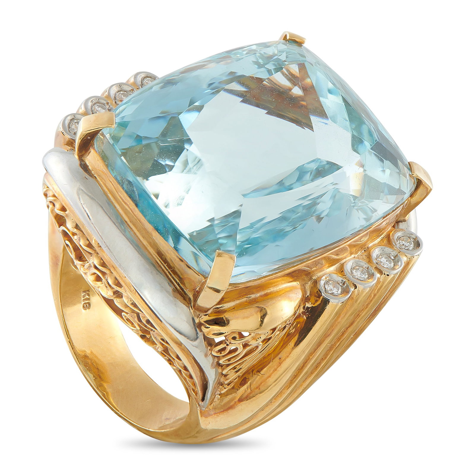 18K White and Yellow Gold 0.15ct Diamond and Aquamarine Ring: This luxury ring is meant to be admired. The ornate 18K Yellow Gold setting comes to life thanks to subtle touches of 18K White Gold. At the center, a breathtaking 54.70 carat Aquamarine is further el